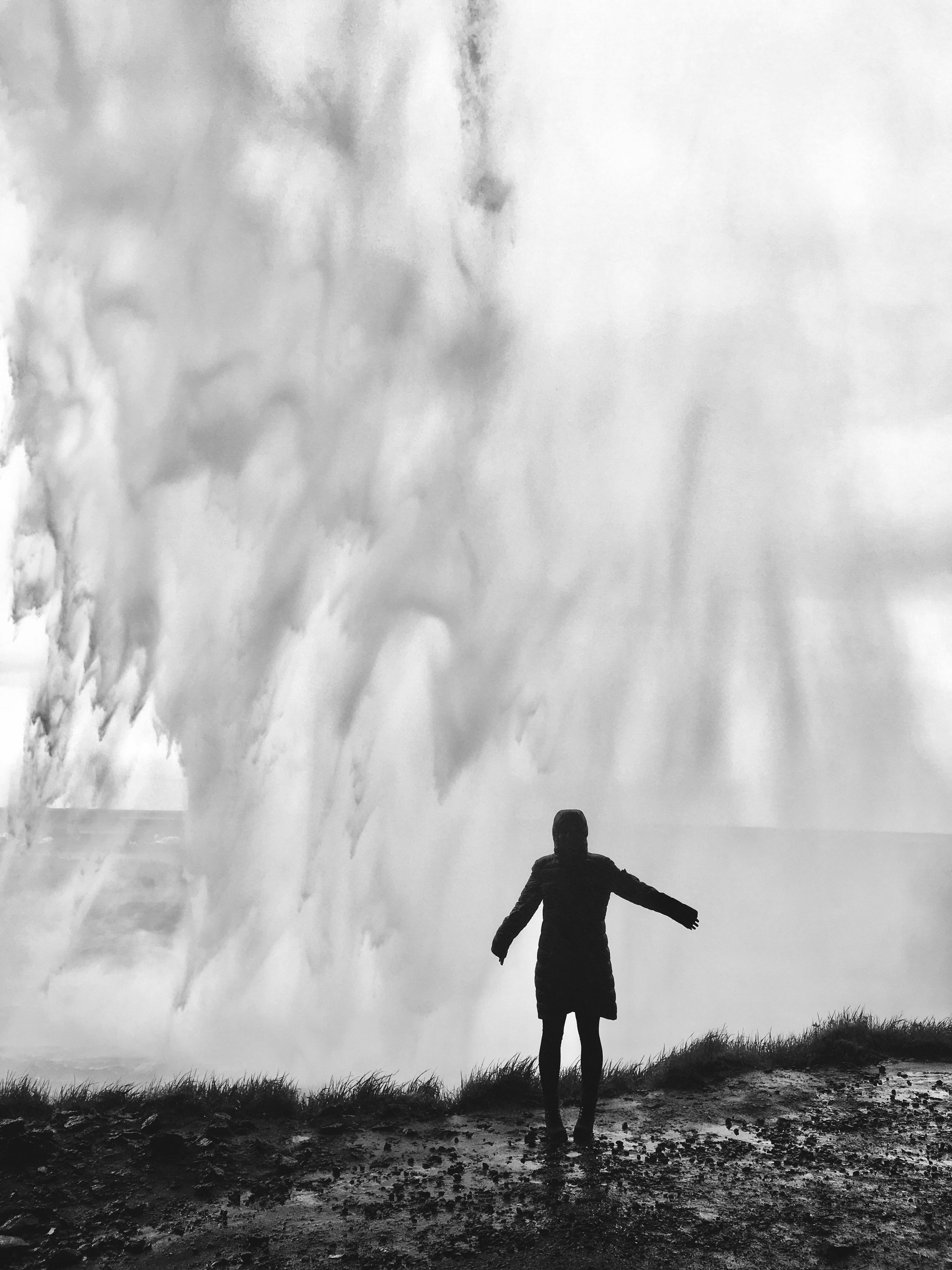 Icelandic waterfall and one person