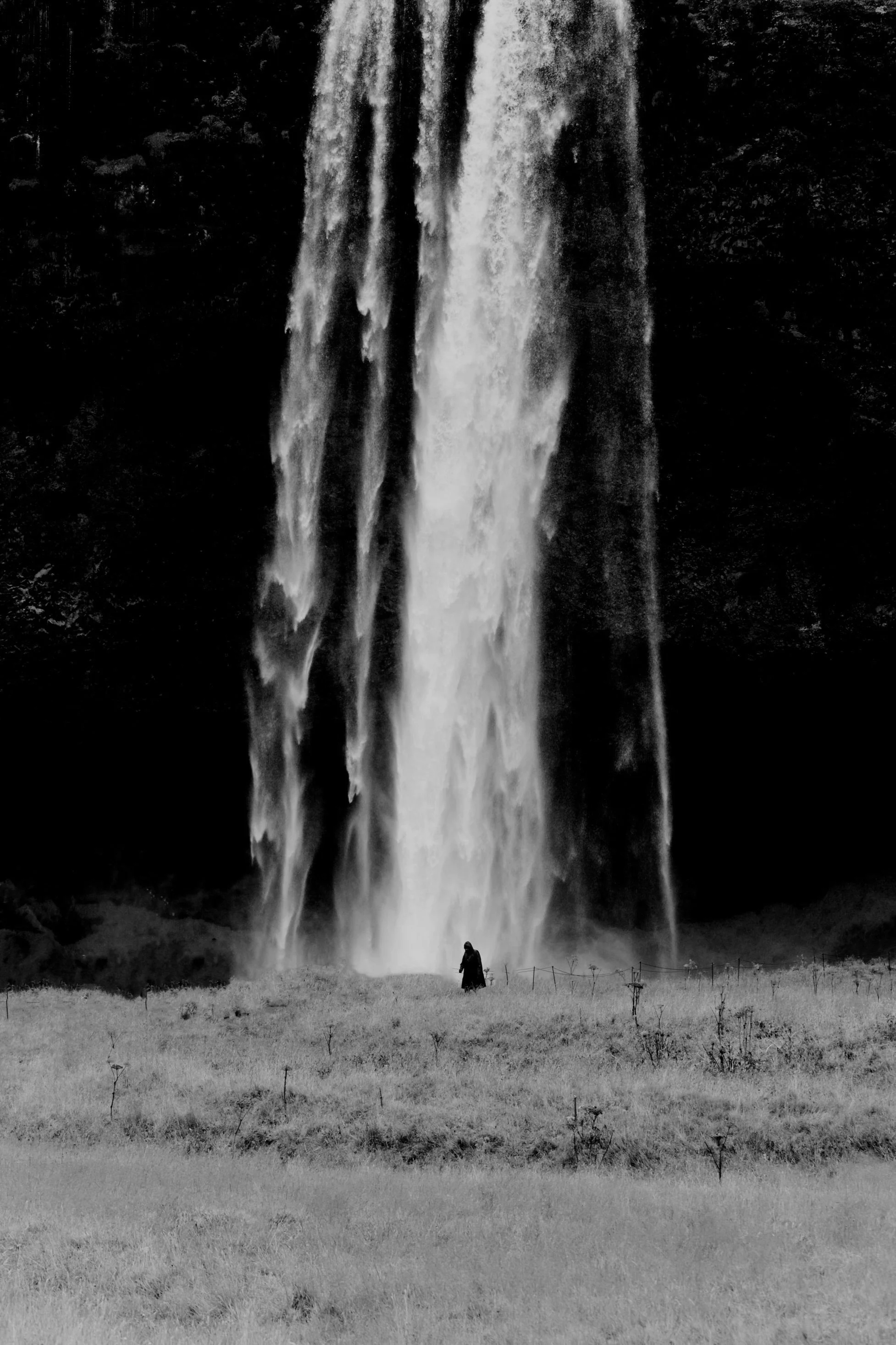 Icelandic waterfall and one person