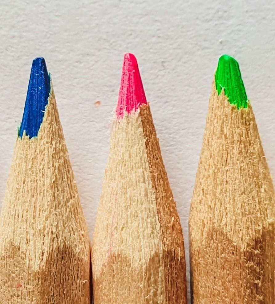 Pencils: blue, red, and green.