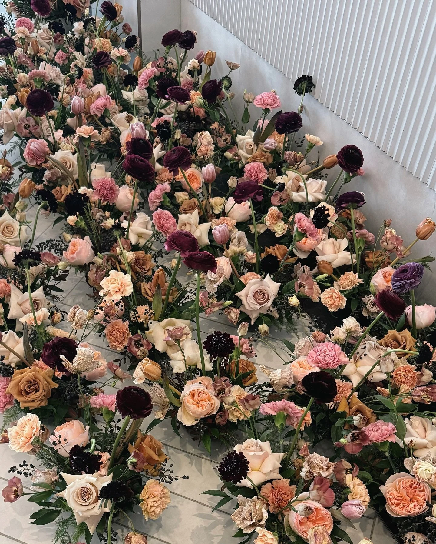 Still swooning over this breathtaking transformation at Royal Ambassador✨🕯️ The warm glow of the candlelight paired with moody, romantic tones and a soft sprinkling of snow made even this wedding reception of over 500 guests feel cozy and intimate. 