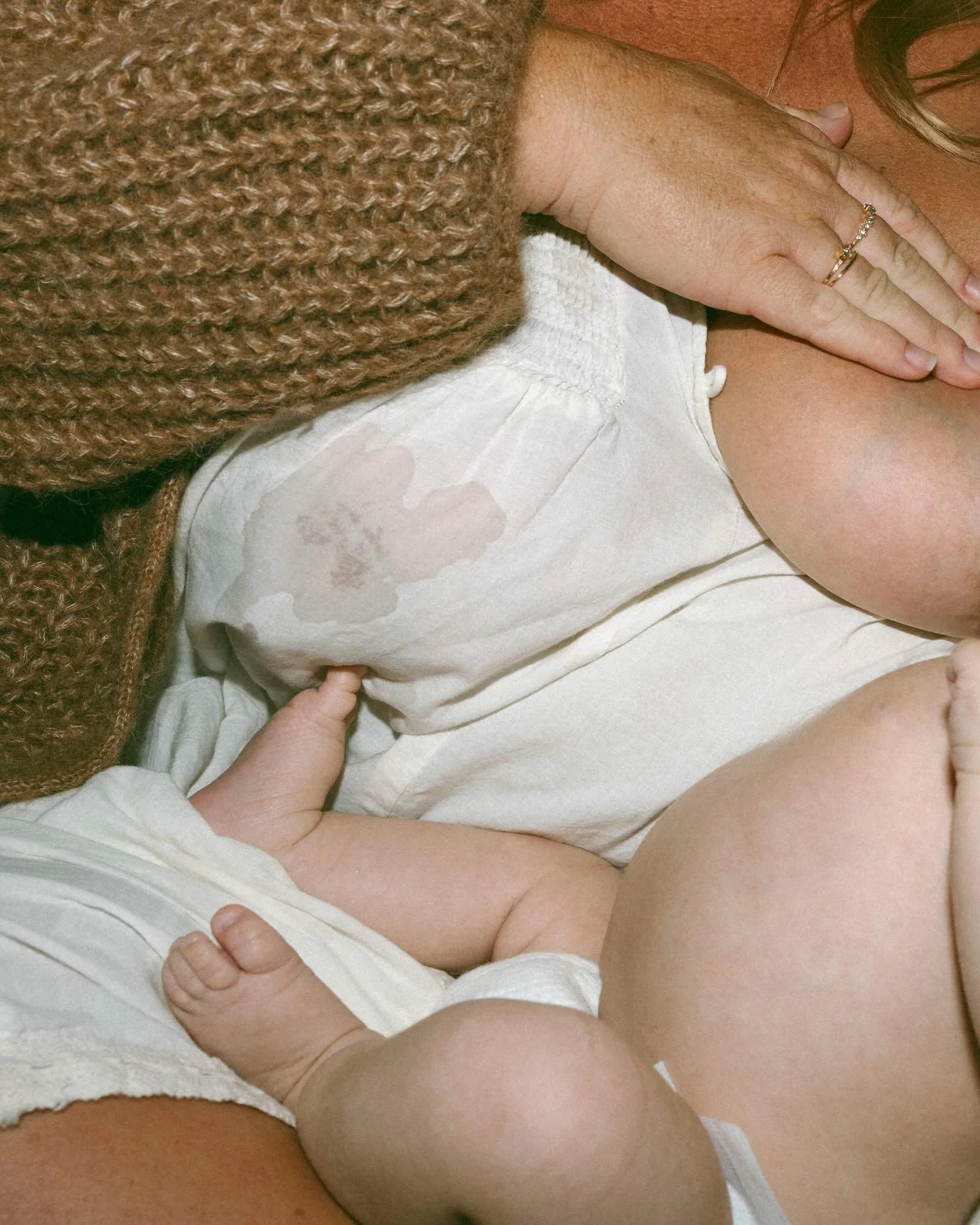 Cracked open in heart and womb, leaking blood, tears, and milk.