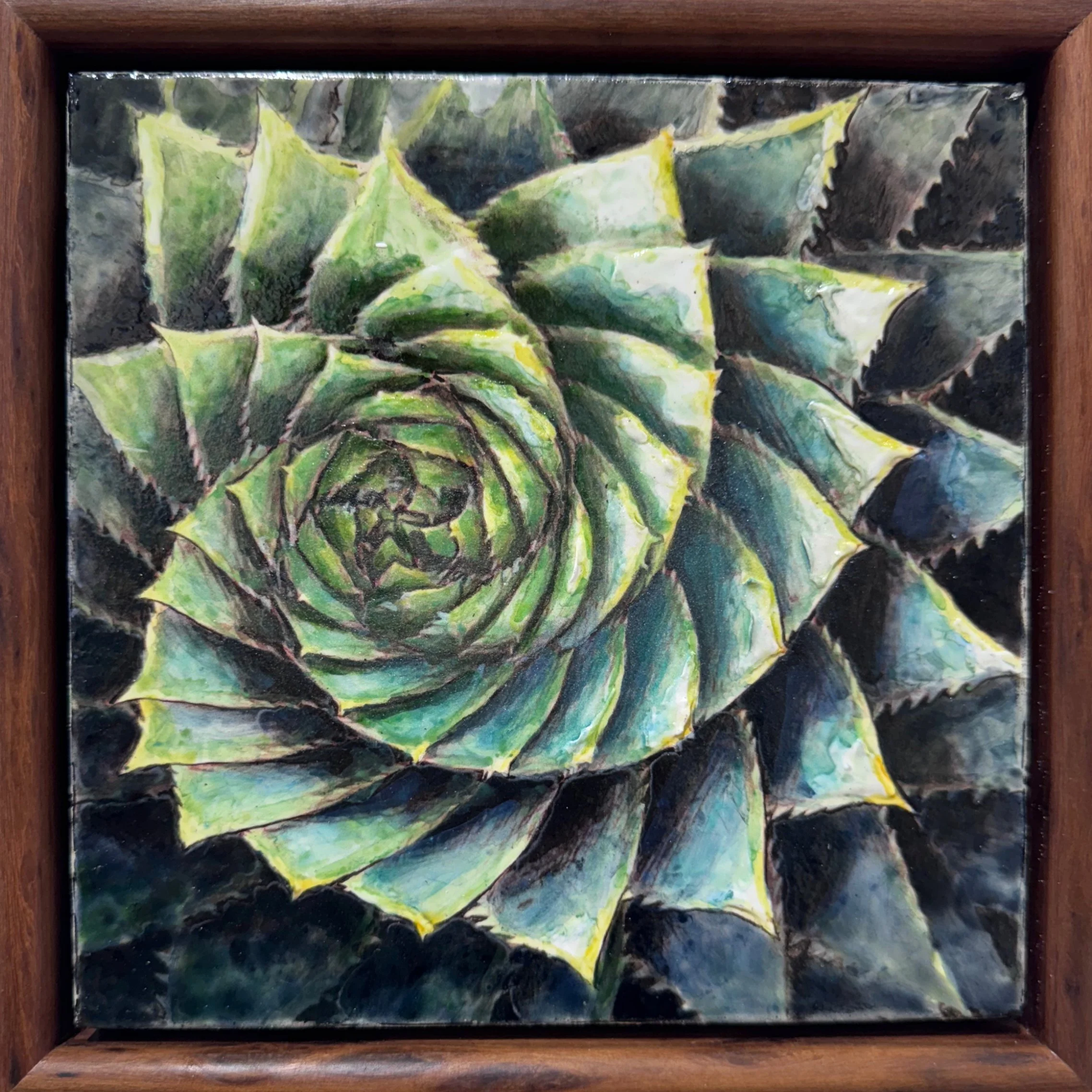 Enamel artwork of an aloe plant rendered in spiralling blue-green layers