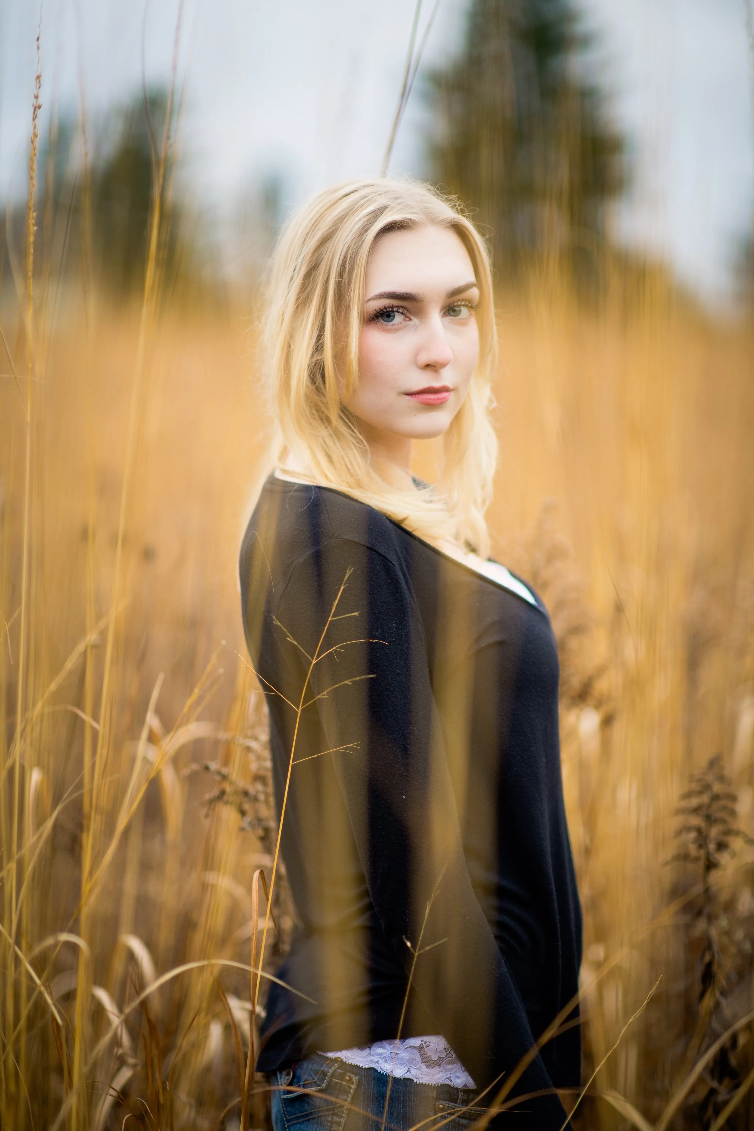 senior girl badass in fall field.jpg