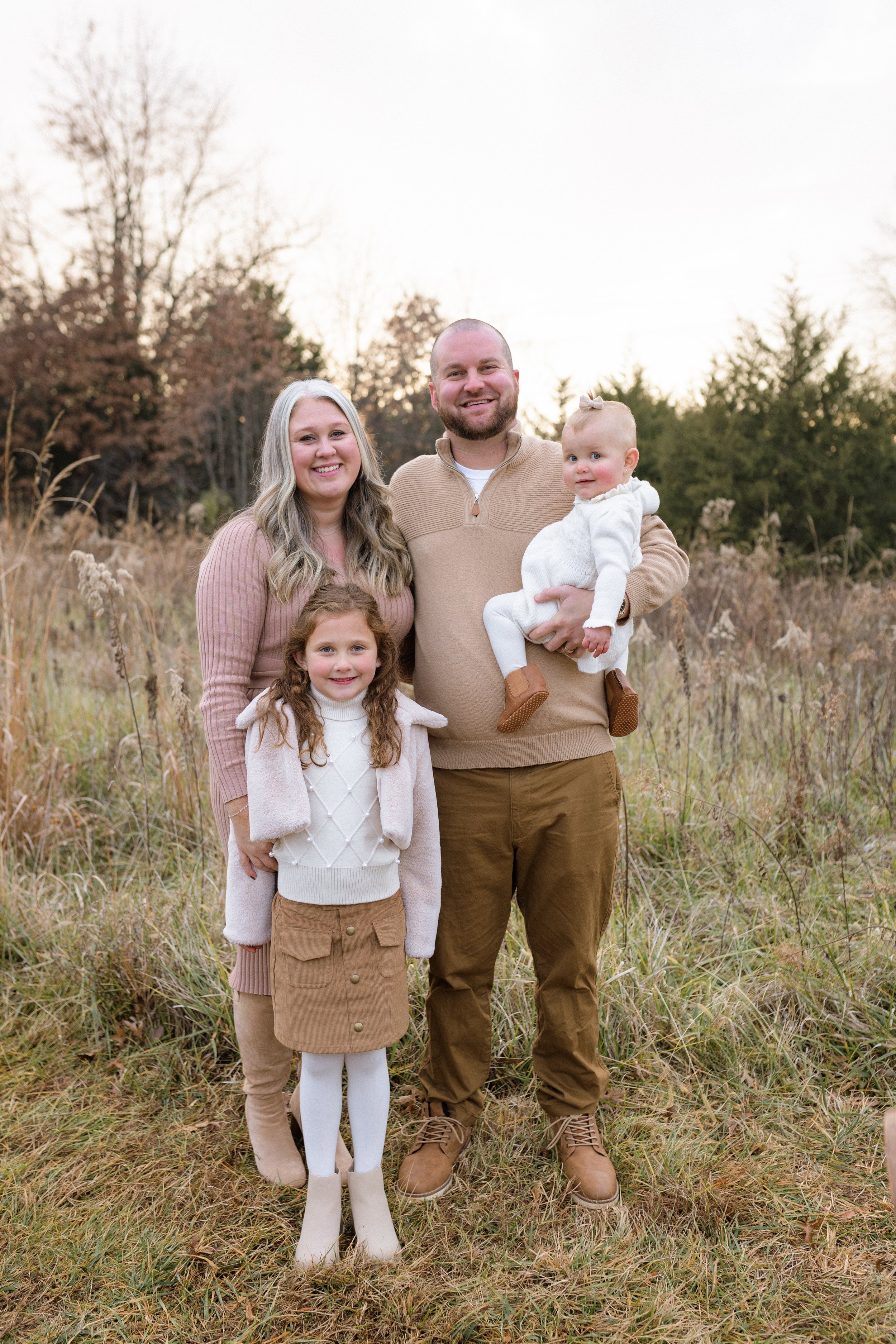 Full posed family photo at a park in Haymarket VA for fally family photos. Amanda Kahnell Photography
