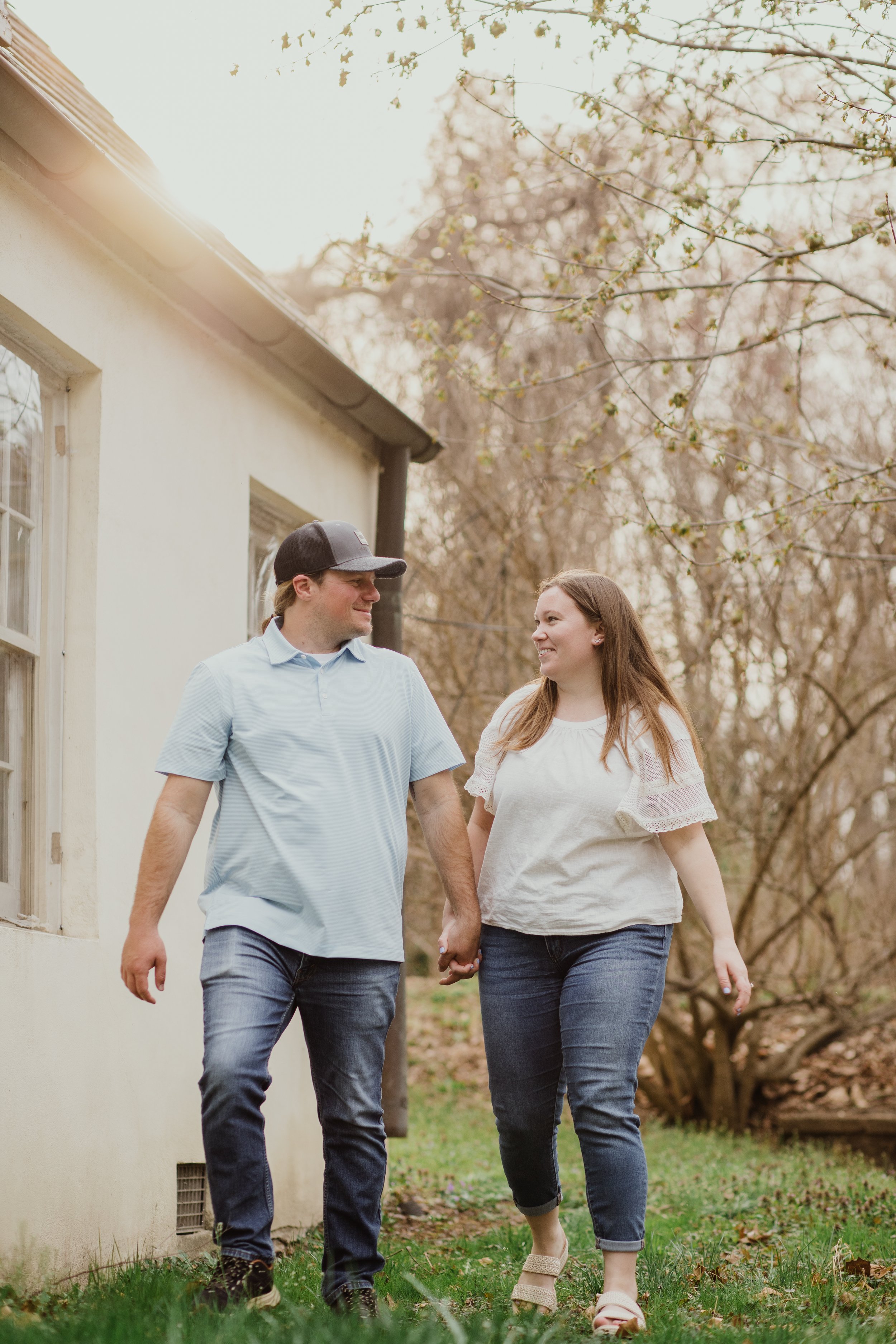 couple walking spring engagement session