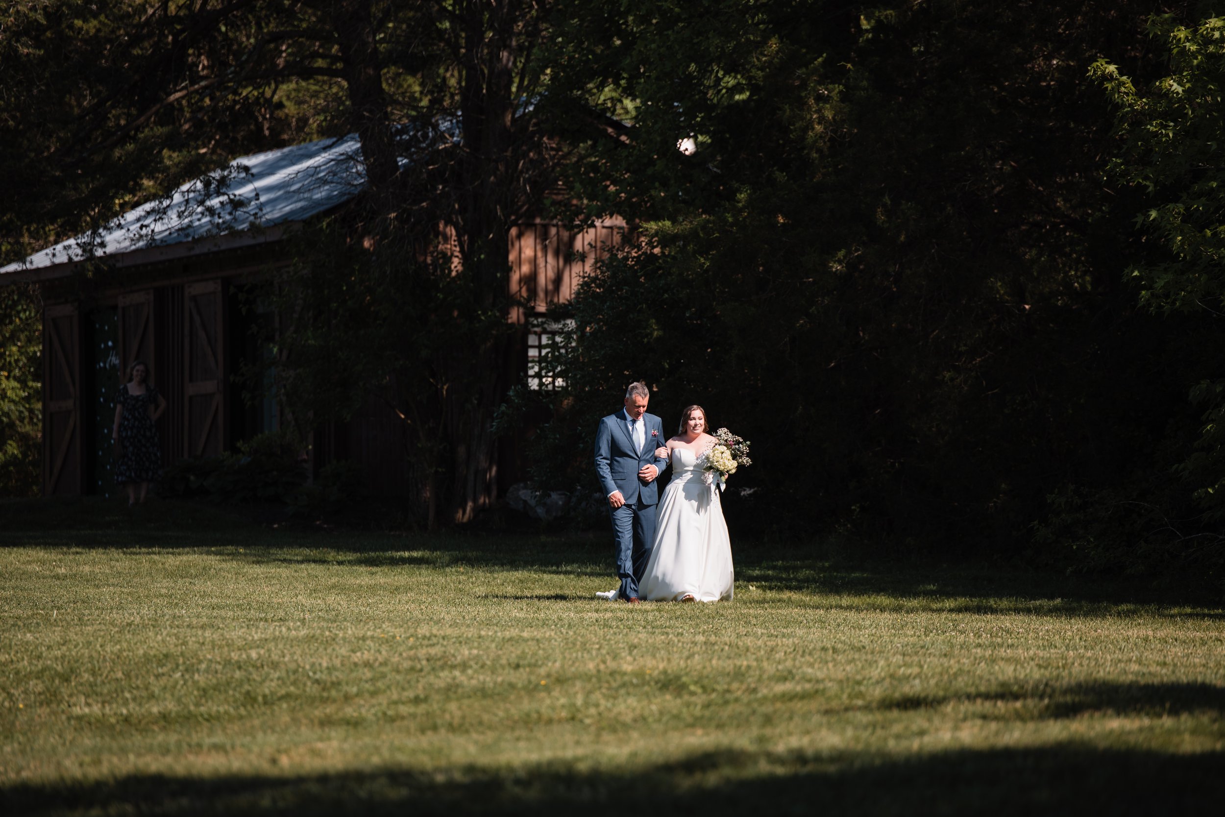 persimmon-creek-barn-bride-walking-with-father-beaverdam-va.jpg