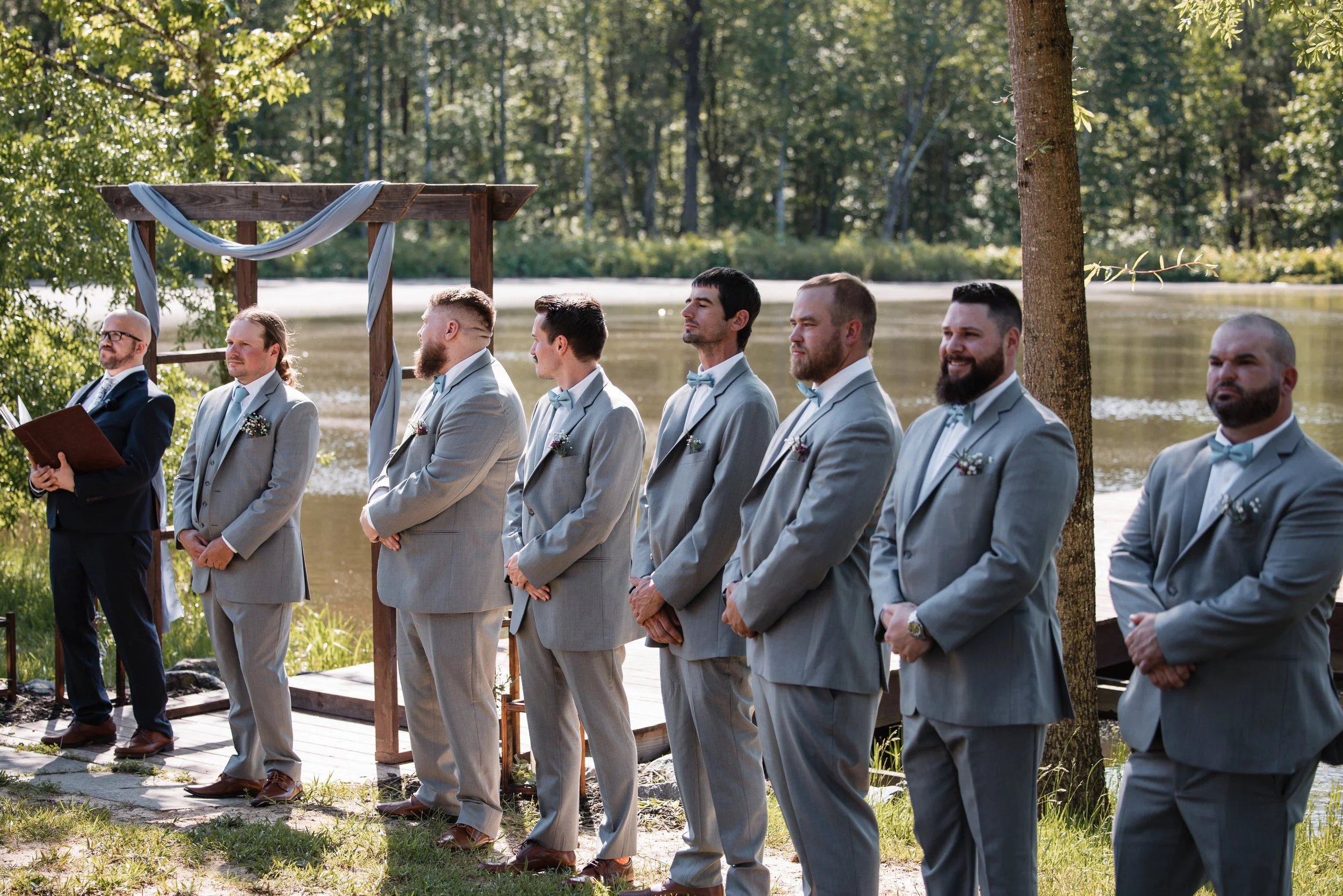 persimmon-creek-barn-groomsmen-lakeside-ceremony.jpg