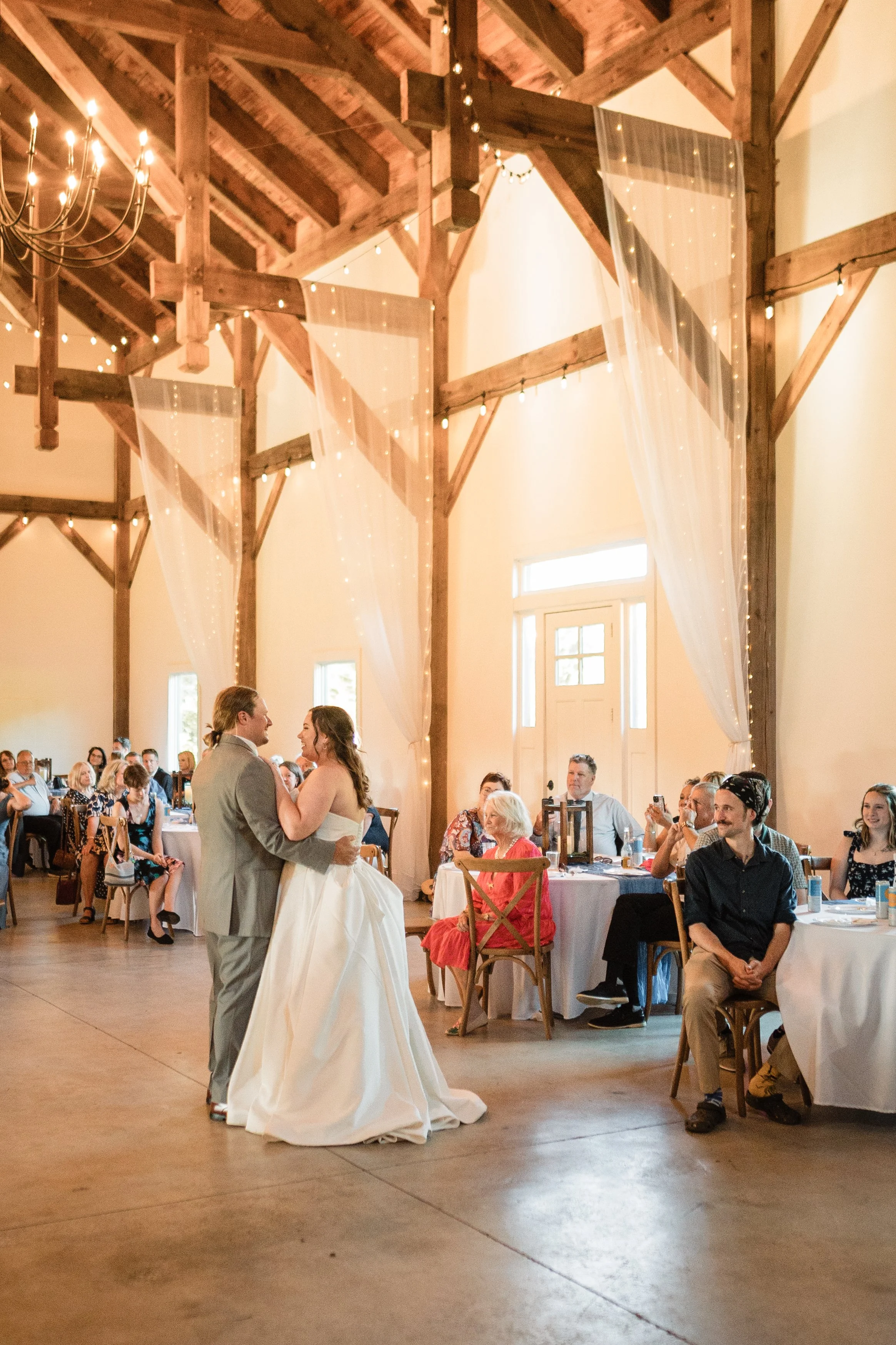 caitlin-johnathan-persimmon-creek-barn-first-dance-wide.jpg