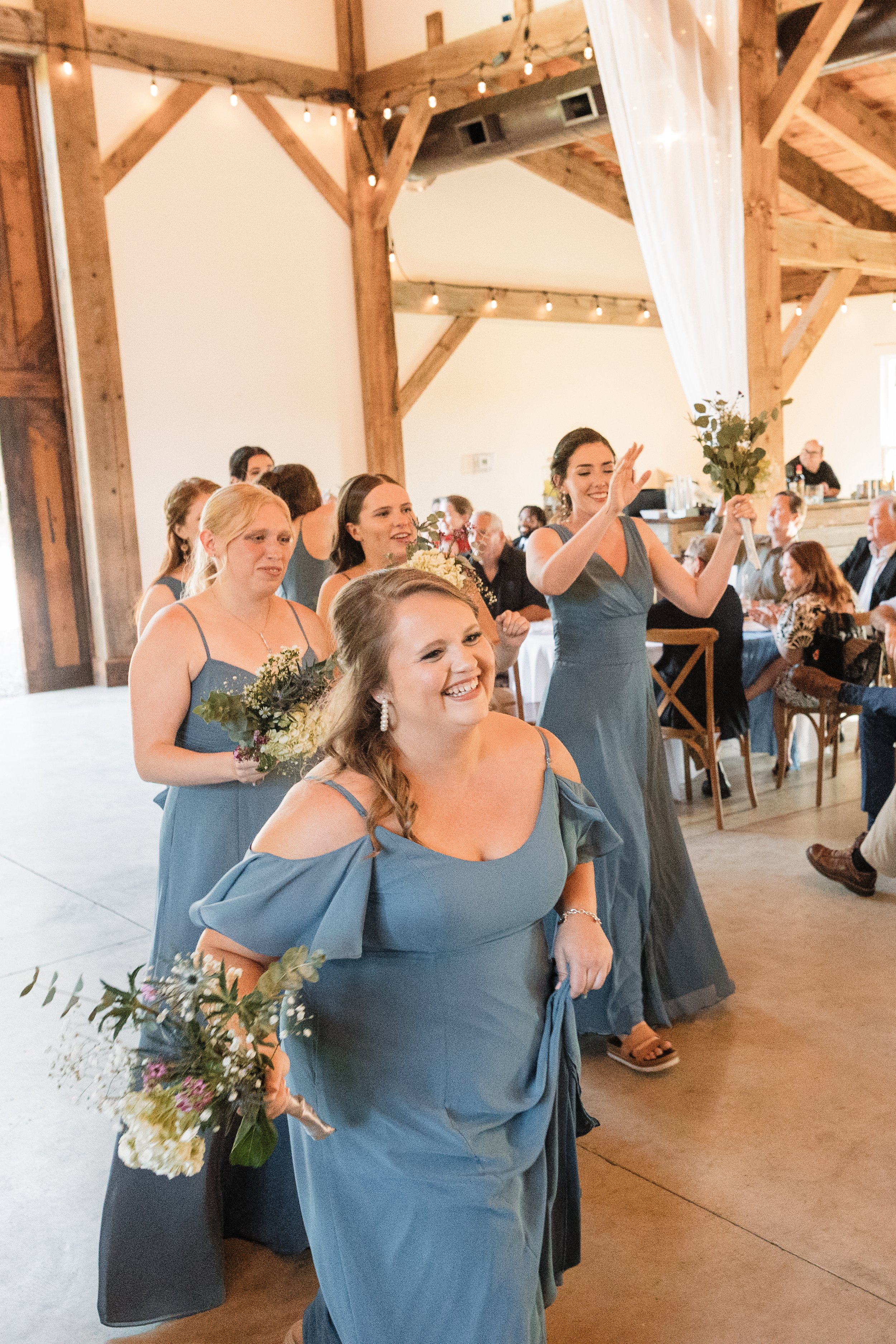 caitlin-johnathan-persimmon-creek-barn-bridesmaids-reception-entrance.jpg