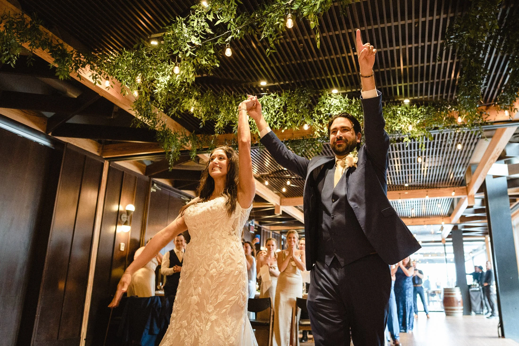 District winery first dance on the waterfront reception space.