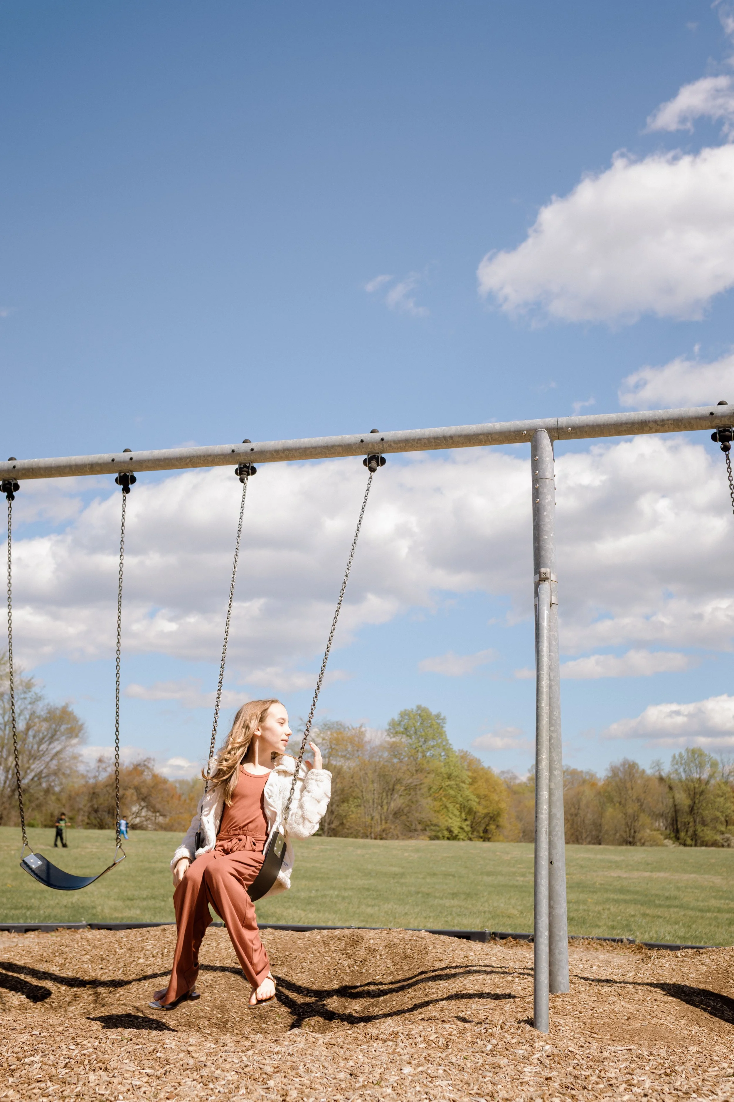 Graduation photos on playground in Fauquier county, va.