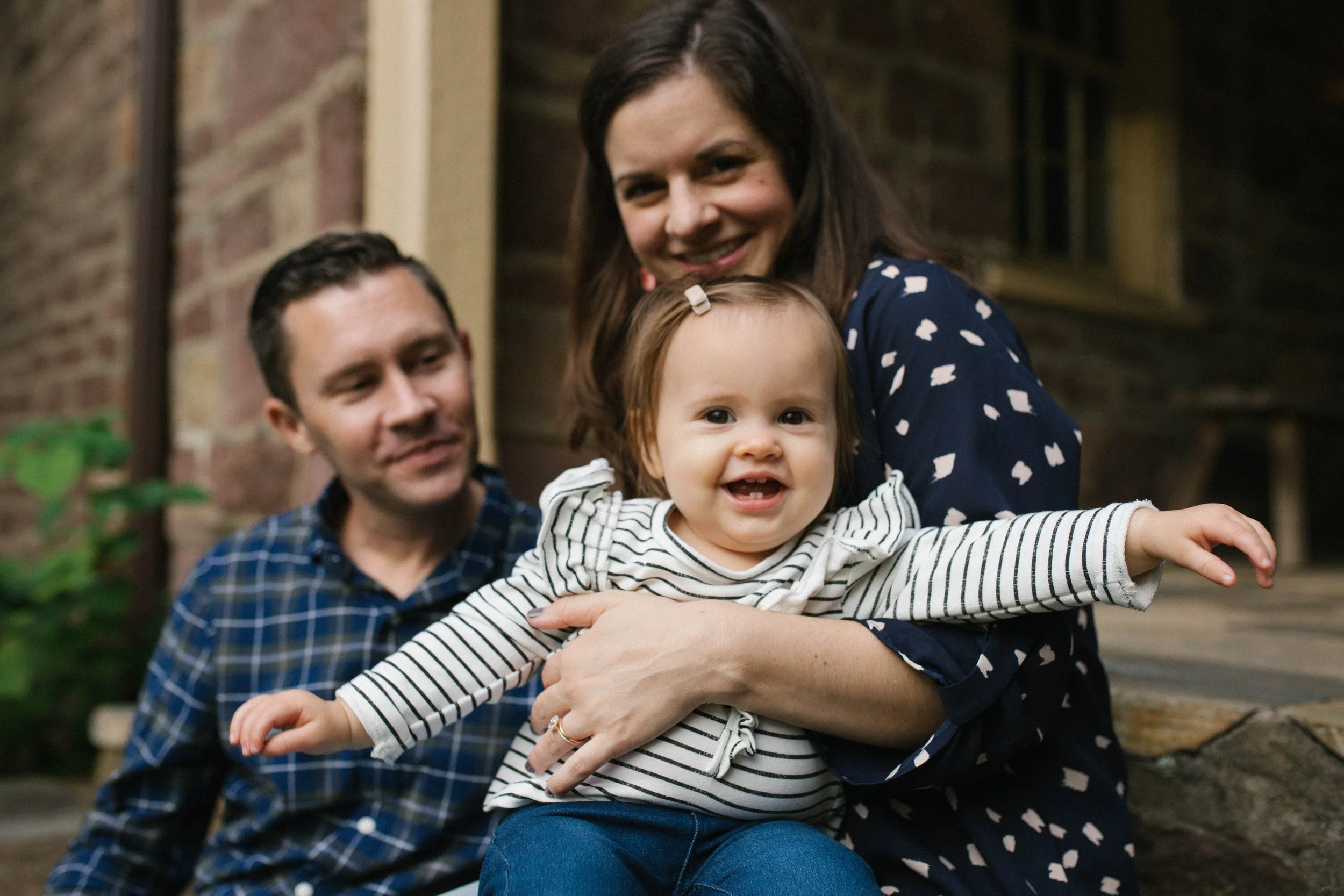 Candid family portrait at Cabells Mill stone house, Ellanor C. Lawrence Park in Chantilly Virginia — Amanda Kahnell Photography