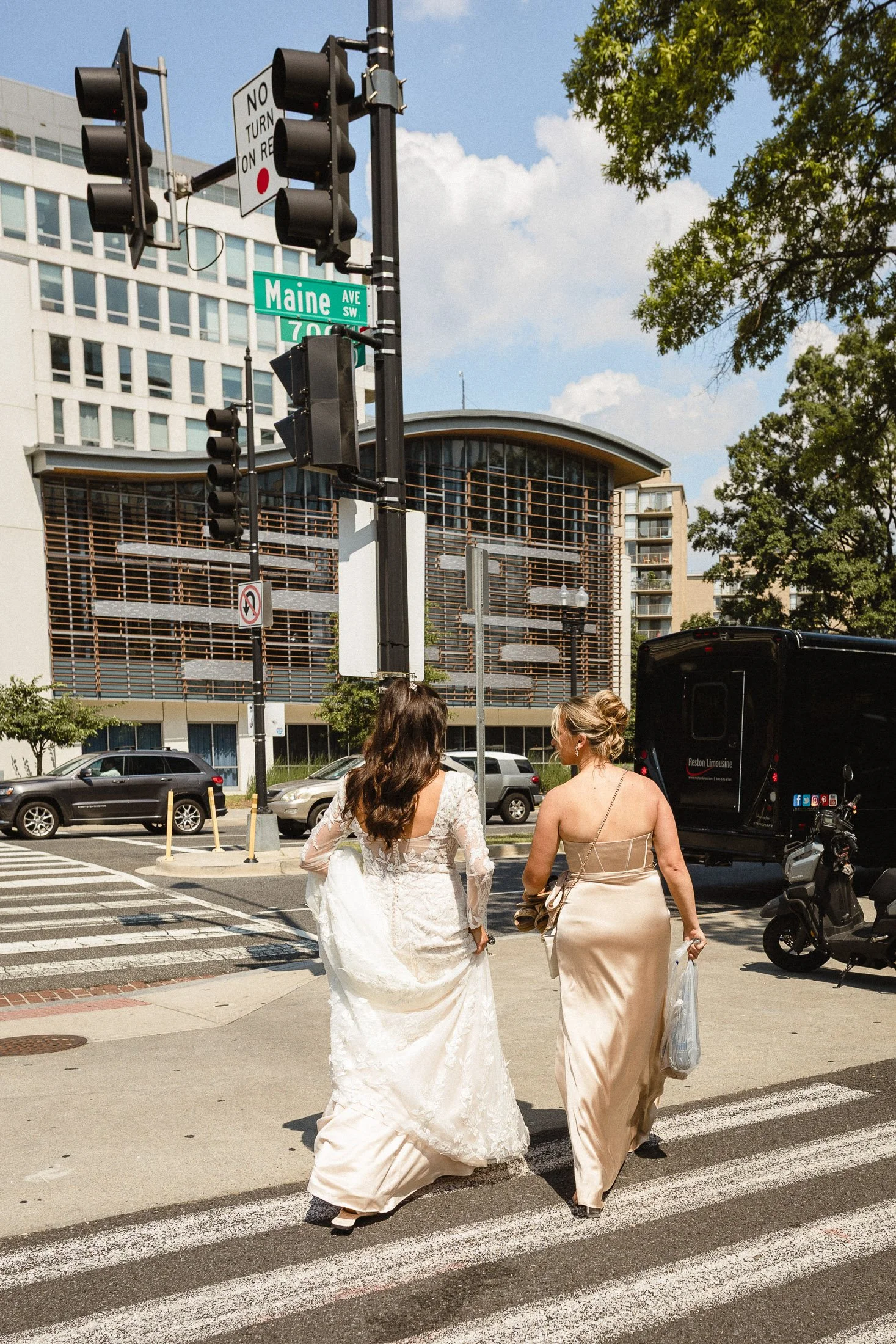 Bride and maid of honor crossing a washington dc street.