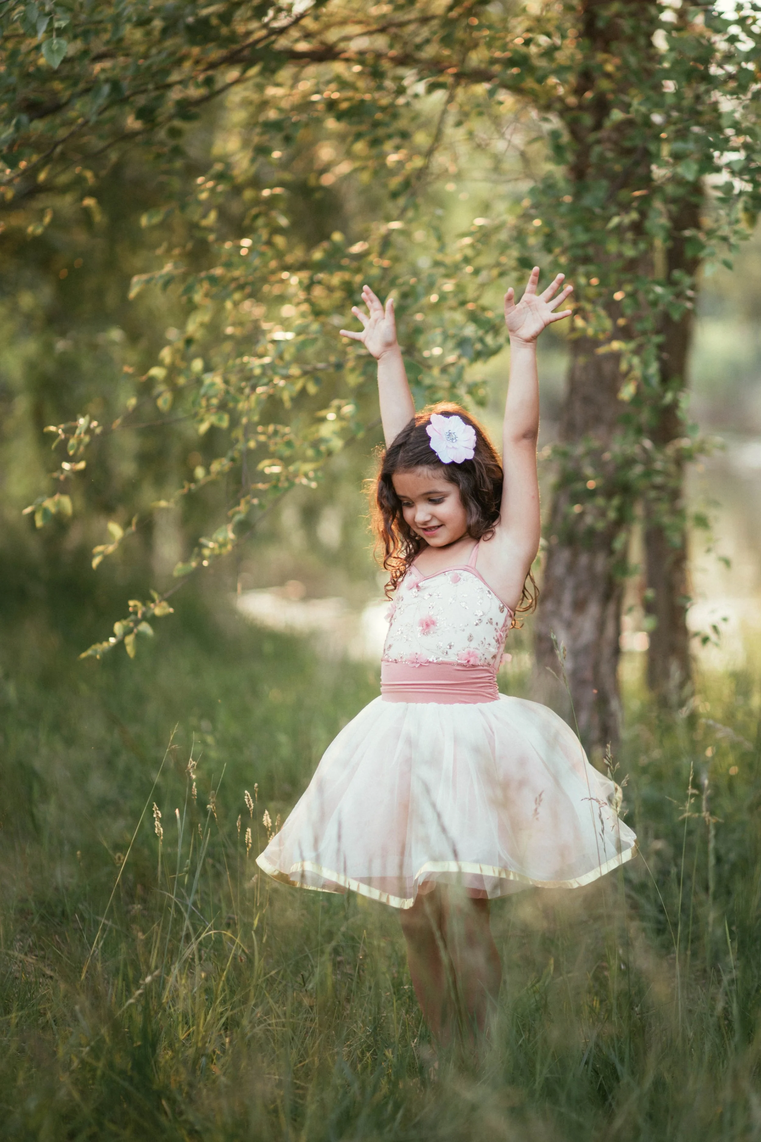 Girl dancing in Northern Fauquier Park for the best locations in spring.
