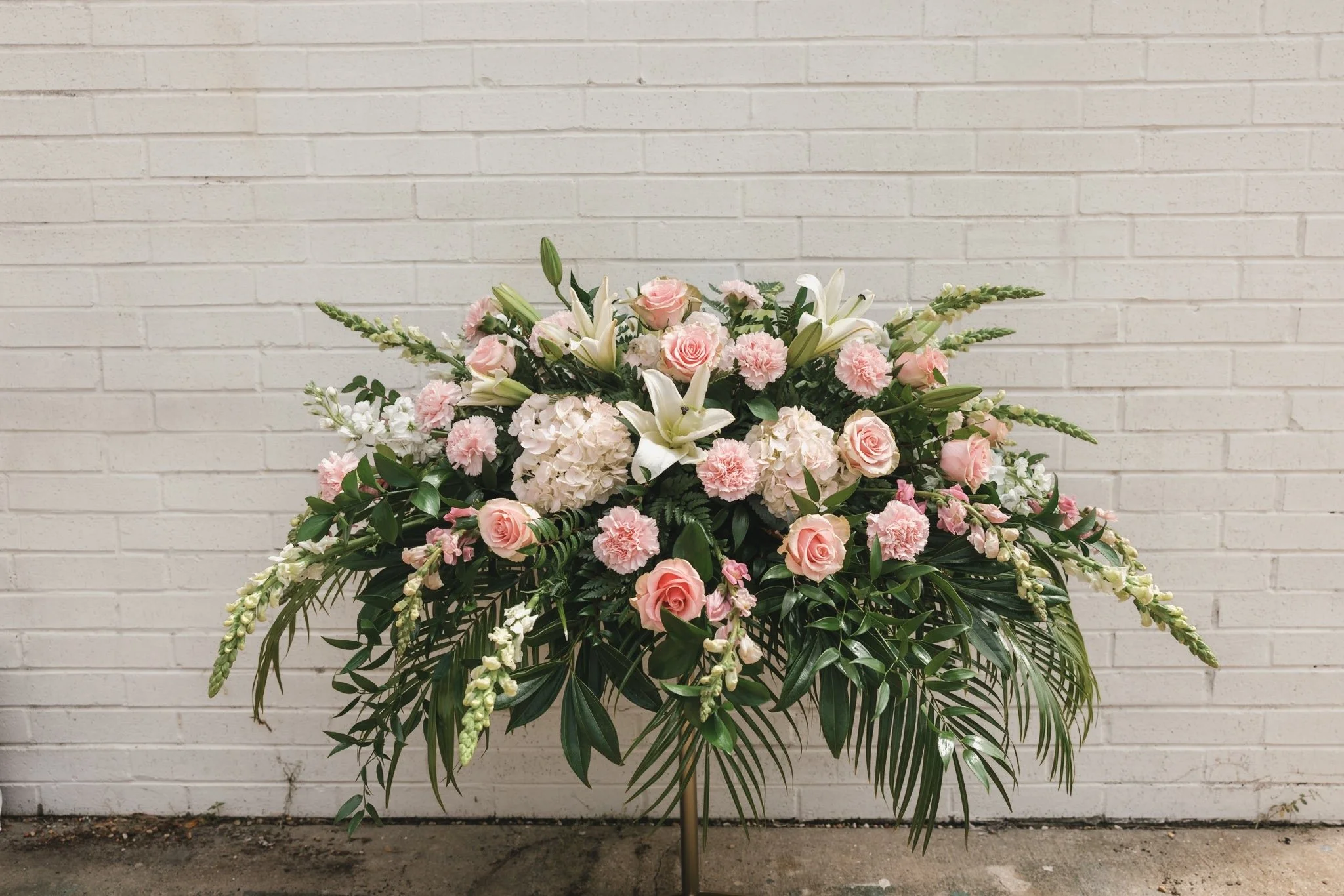 Pretty Pinks Casket Spray