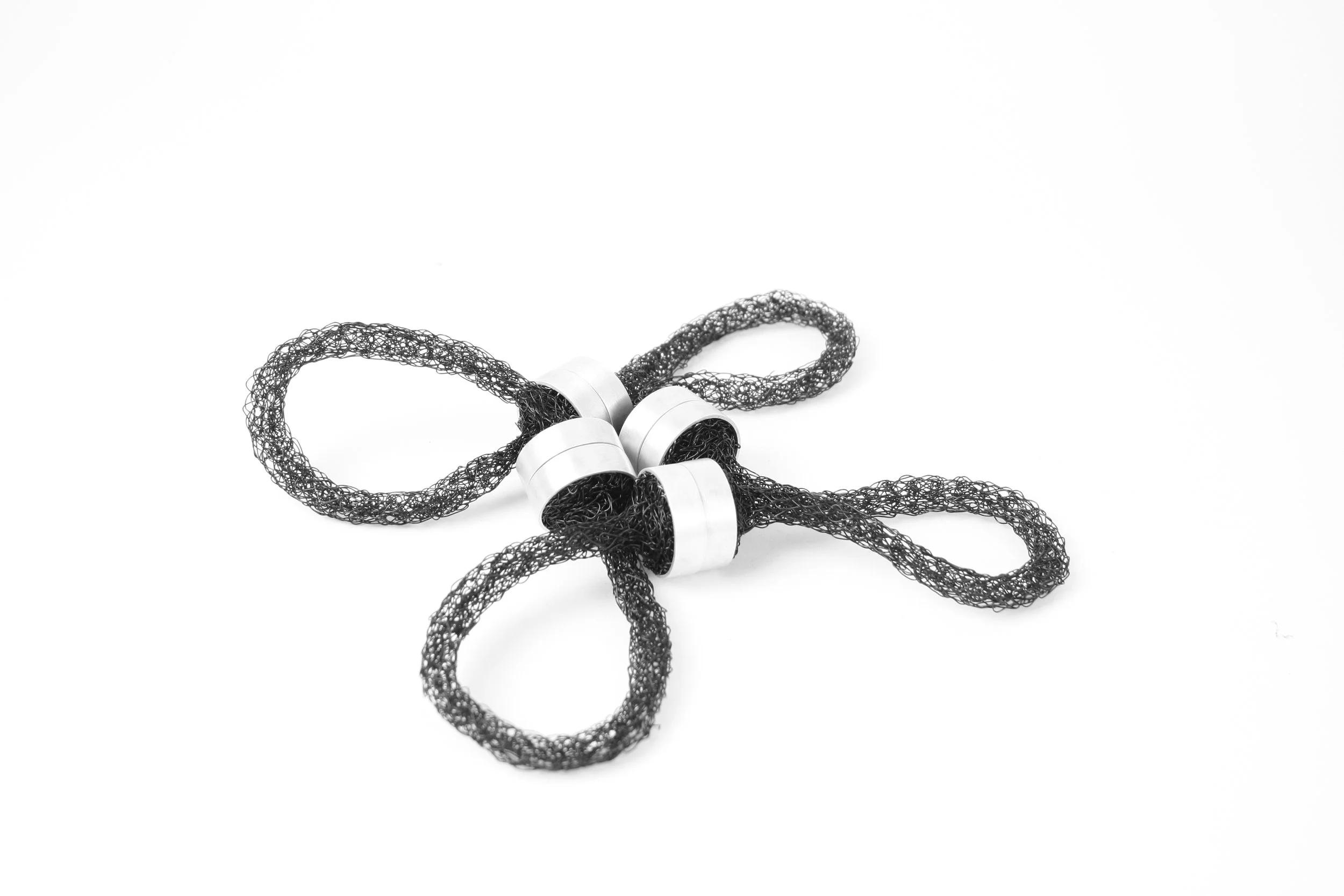 'hold my handle' necklace. 
copper wire (knitted), neodymium magnets, silver