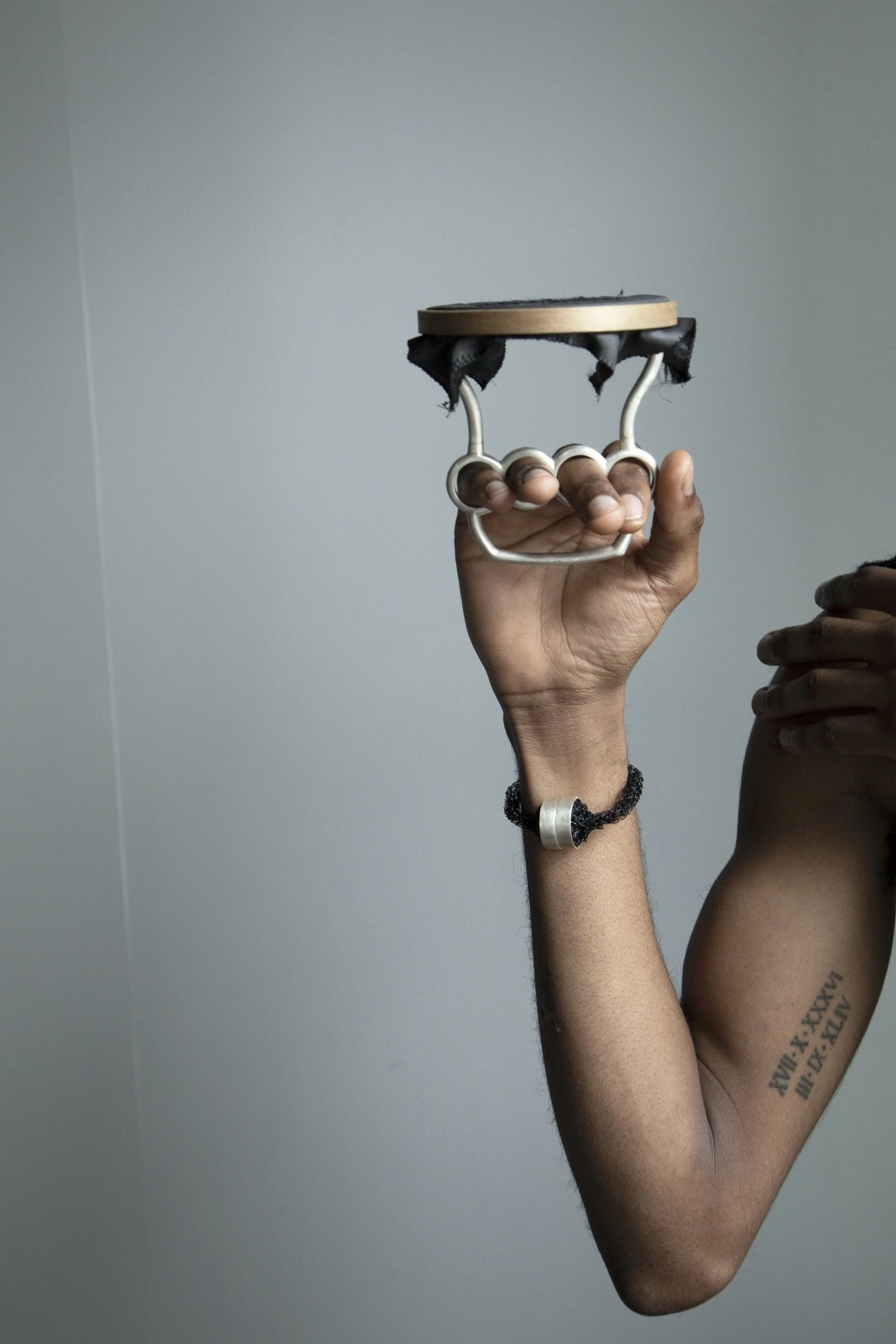 'now she's in mountjoy' silver, school skirt lining, embroidery hoop, thread.