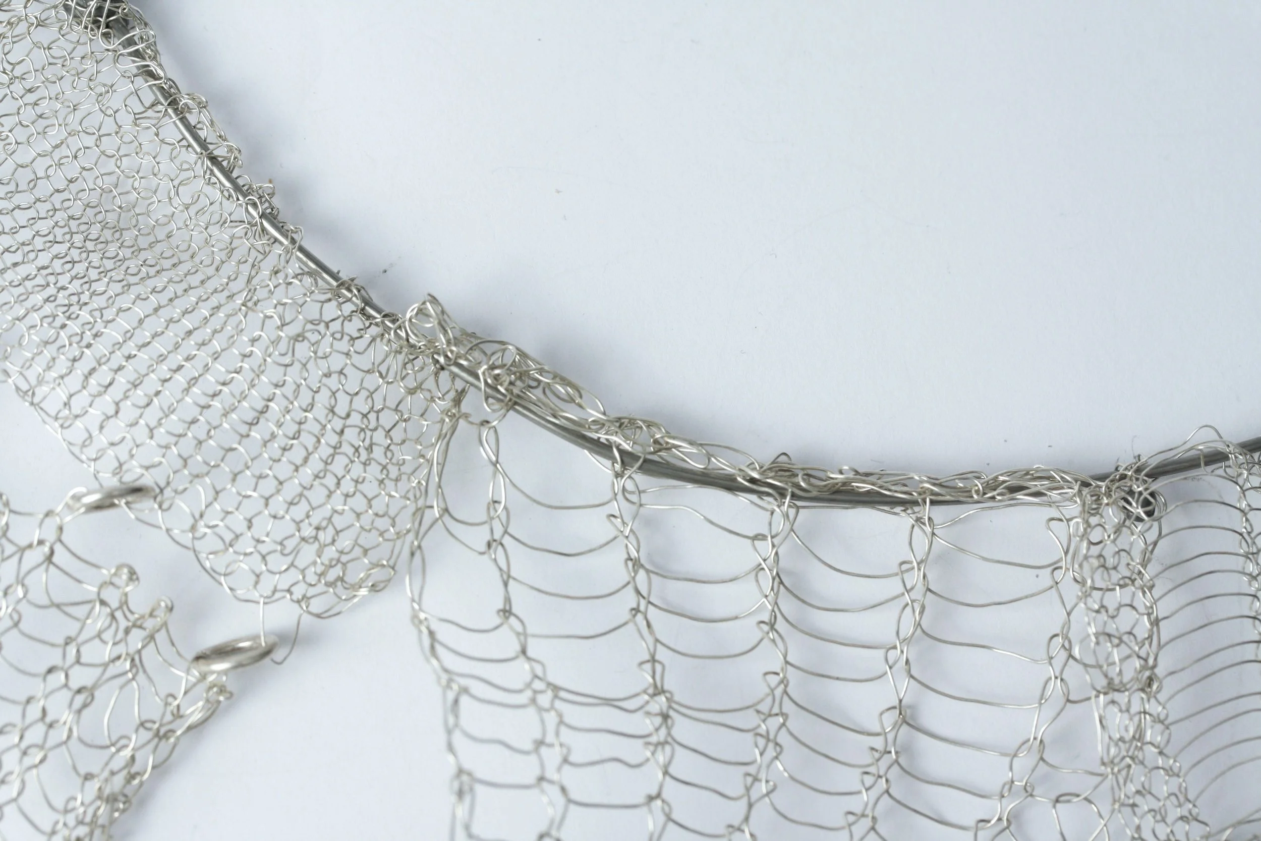 'gone knitting' necklace. silver, steel, lead weights.