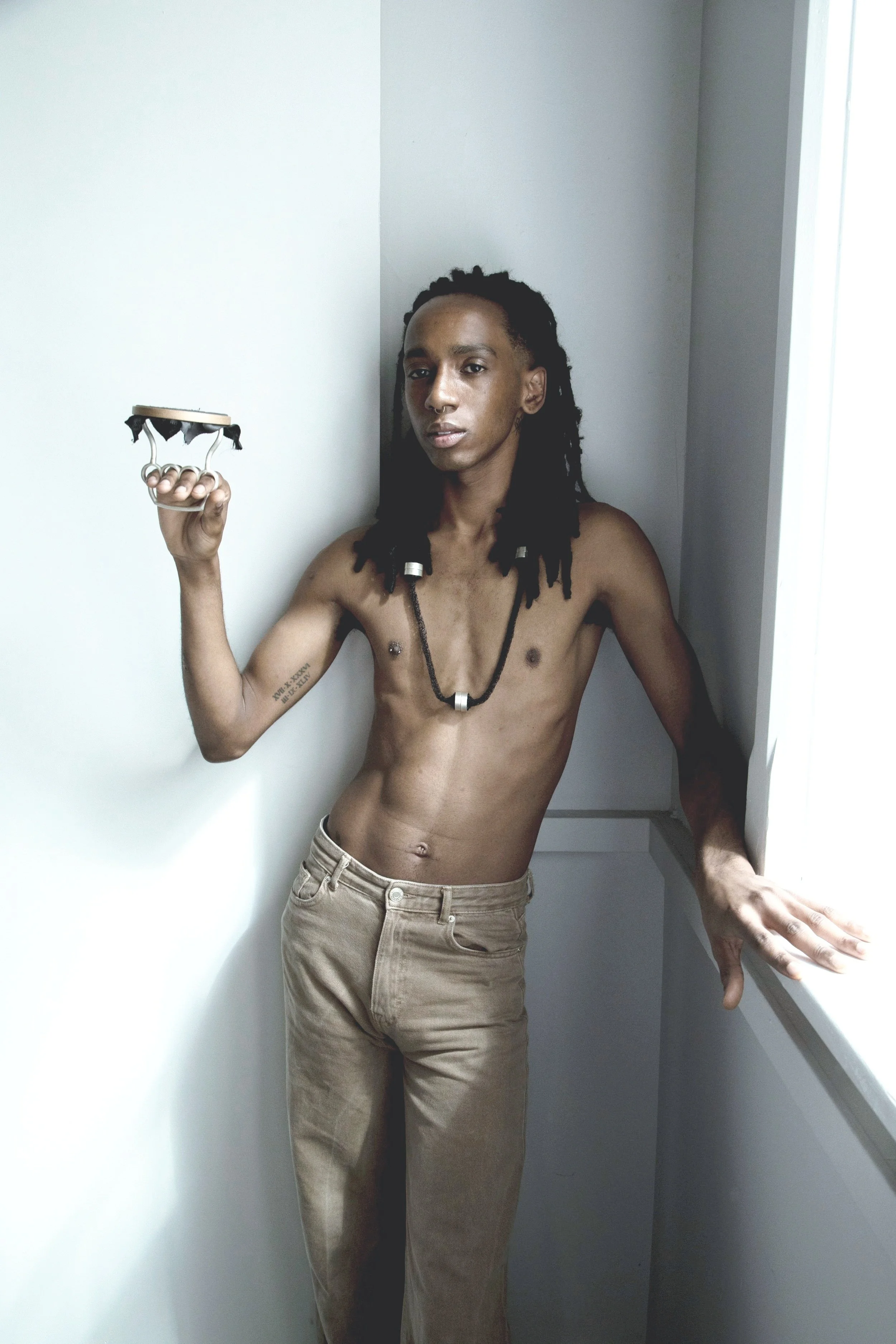 'now she's in mountjoy' silver, school skirt lining, embroidery hoop, thread.