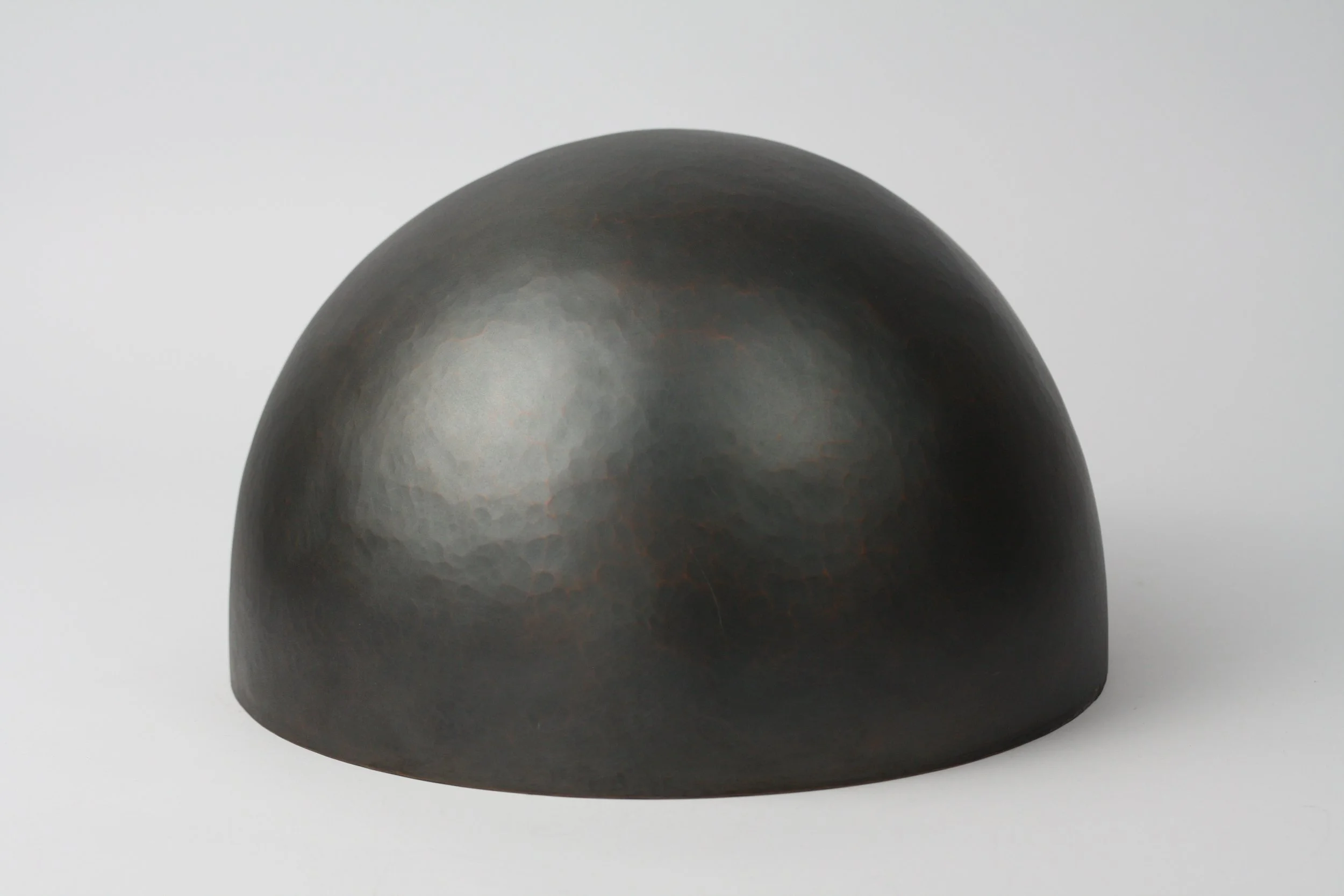 'brute force and determination' hammered vessel. copper