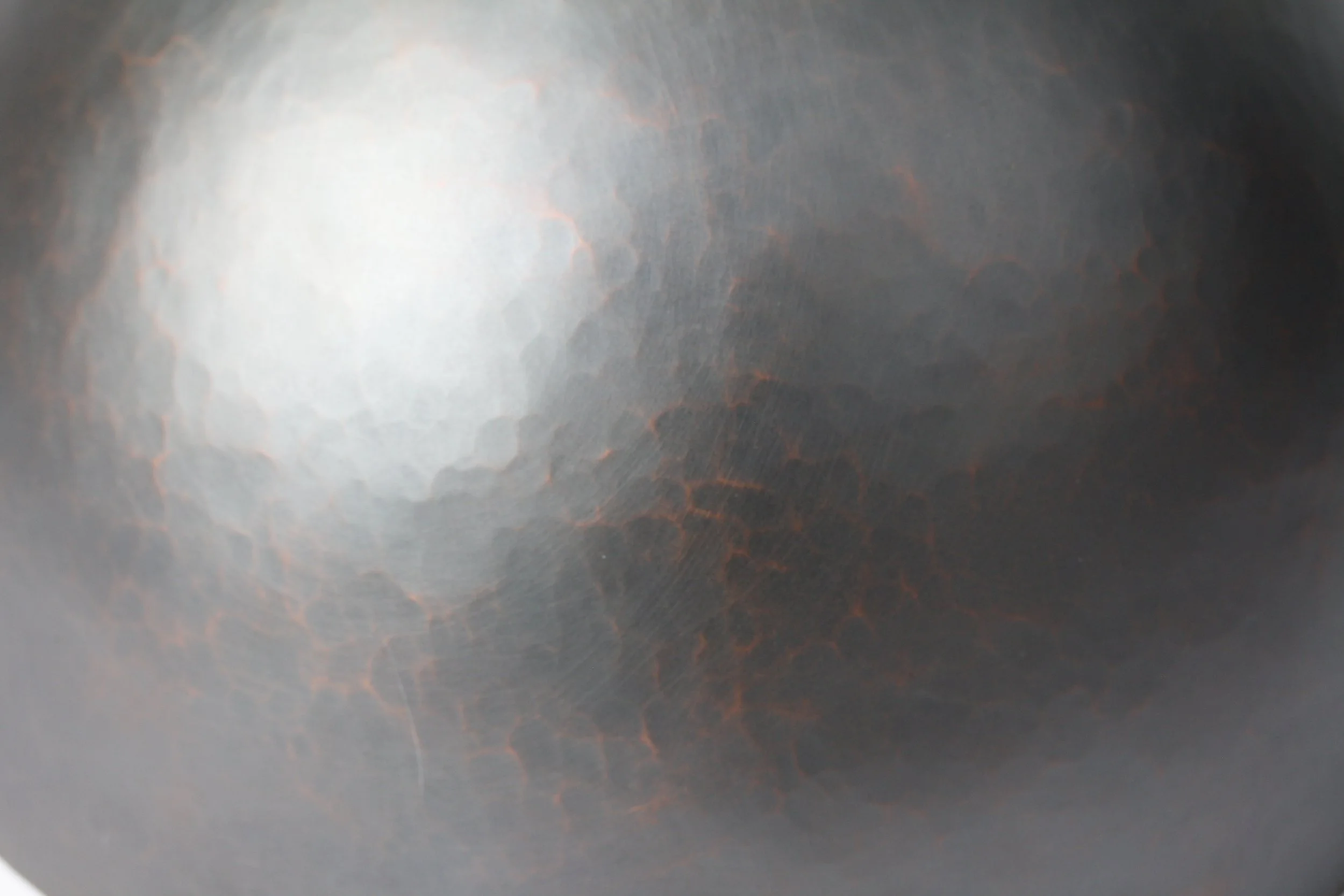 'brute force and determination' hammered vessel. copper