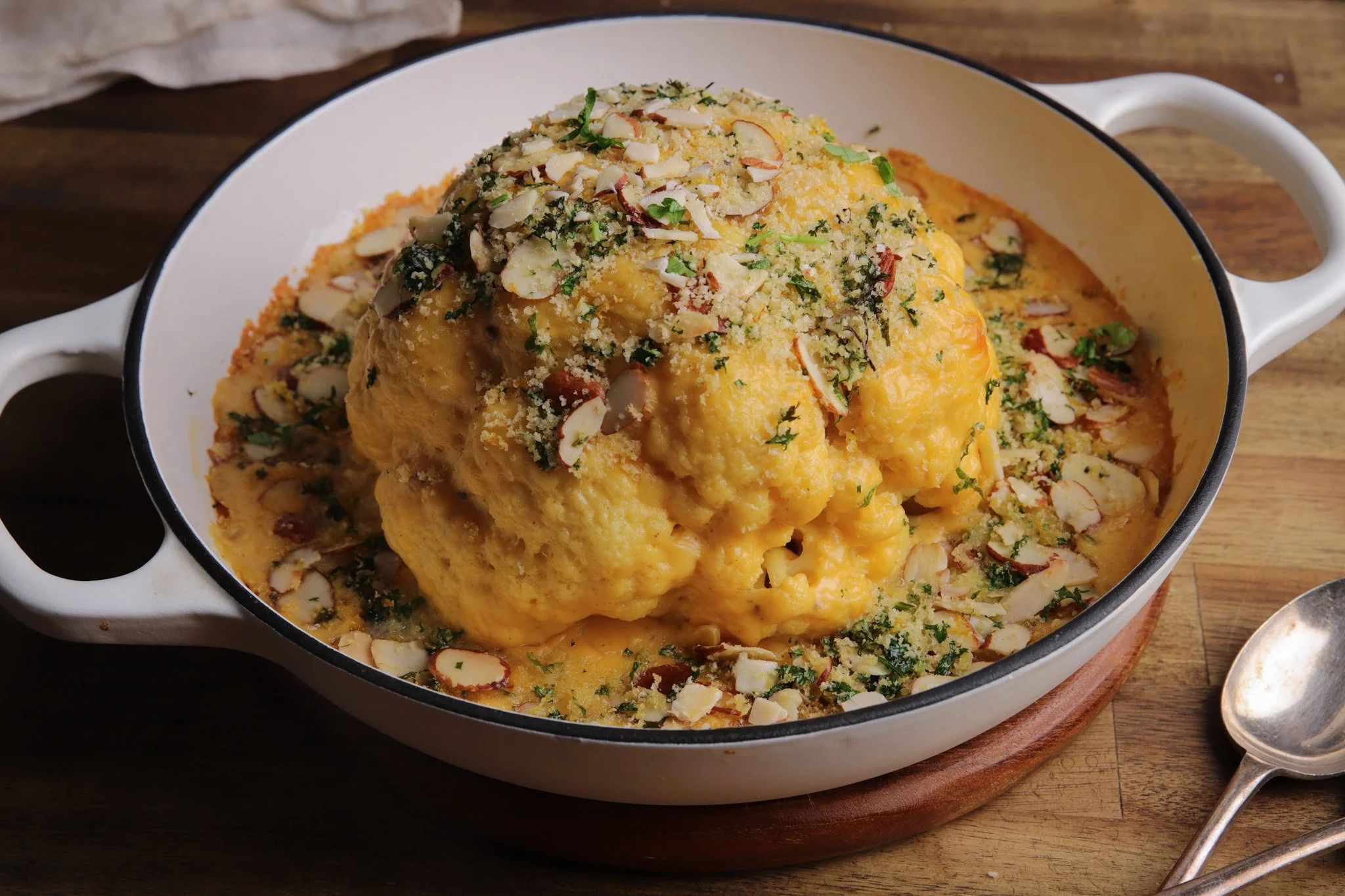 Whole Roasted Cauliflower with Cheesy Sauce &amp; Almonds