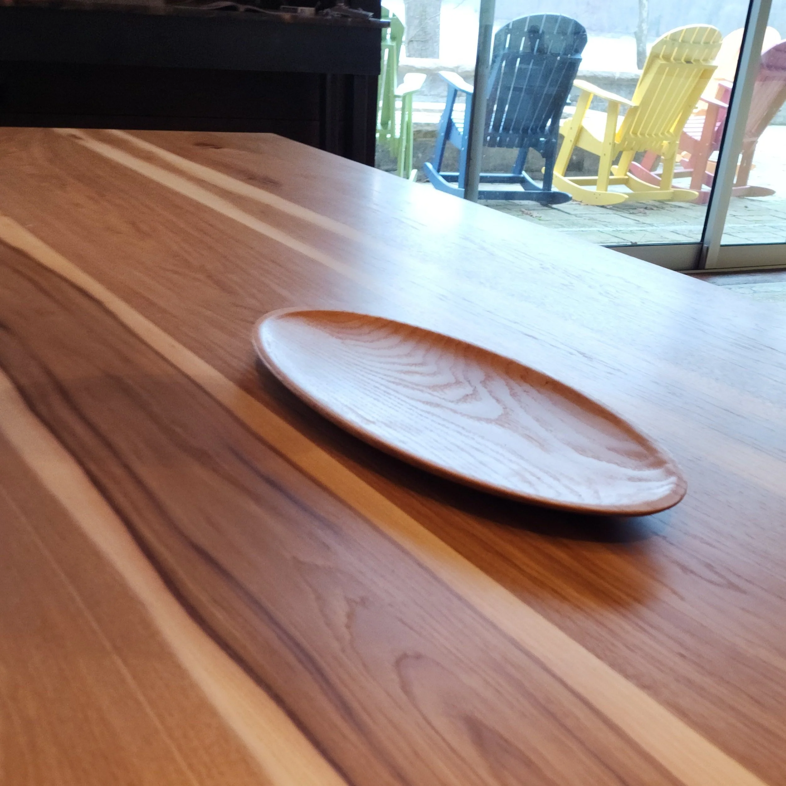 Custom solid hickory dining table with solid red oak carved serving dish featured centerpiece