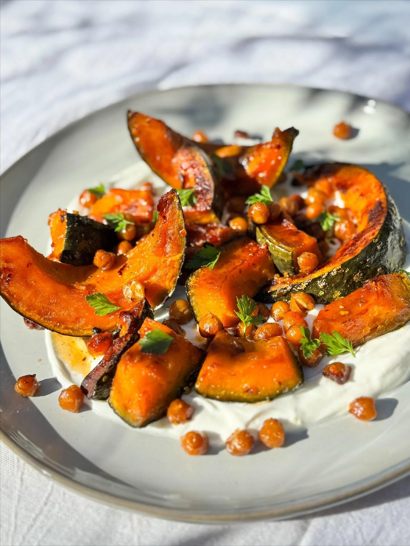 Roasted kabocha &amp; chickpeas with chili crisp &amp; maple-whipped yogurt &mdash; a cozy balance of sweet heat and fall flavor 🍂✨🍁
.
.
.

#fall #privatechef #kabocha #farmtotable #autumnvibes
