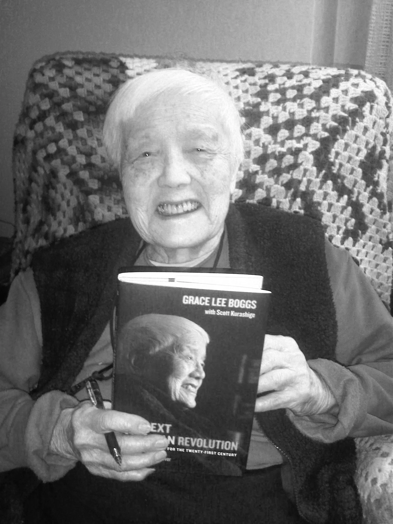 Grace holding Next American Revolution Book.jpg