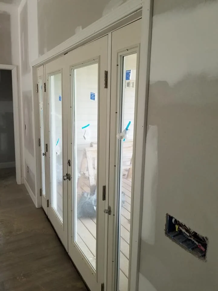 Angled view of front door installation showing seamless alignment.