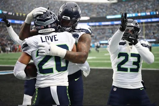 Seattle Steamrolls over Carolina to a 13th Win in Week 17