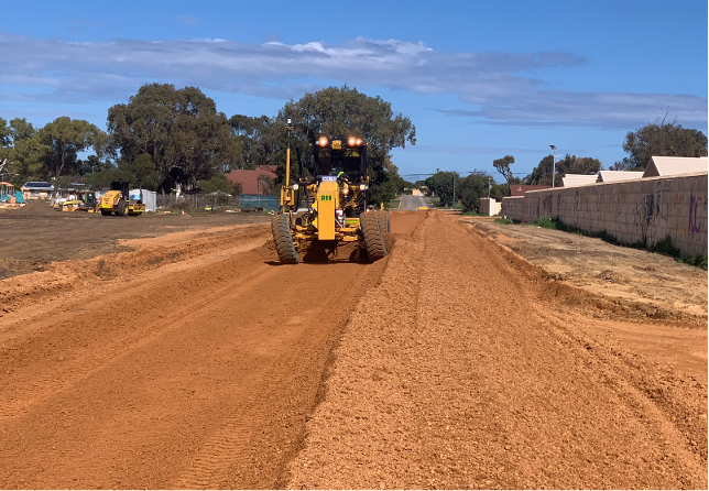 Earthmoving machinery kerbing and footpath works in Midwest WA