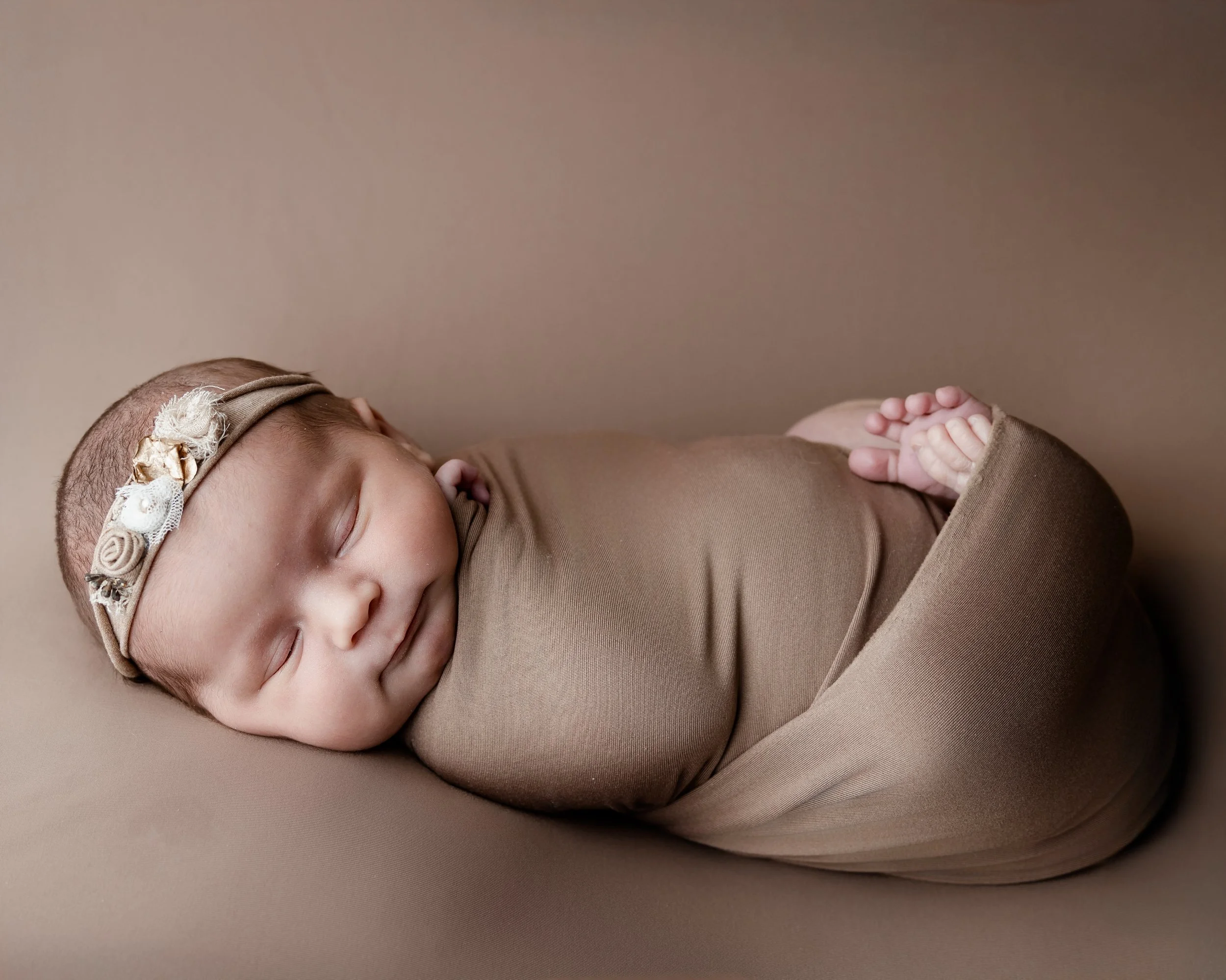 smilende baby-babyfotograf-babyfoto-bergenfotograf.jpeg