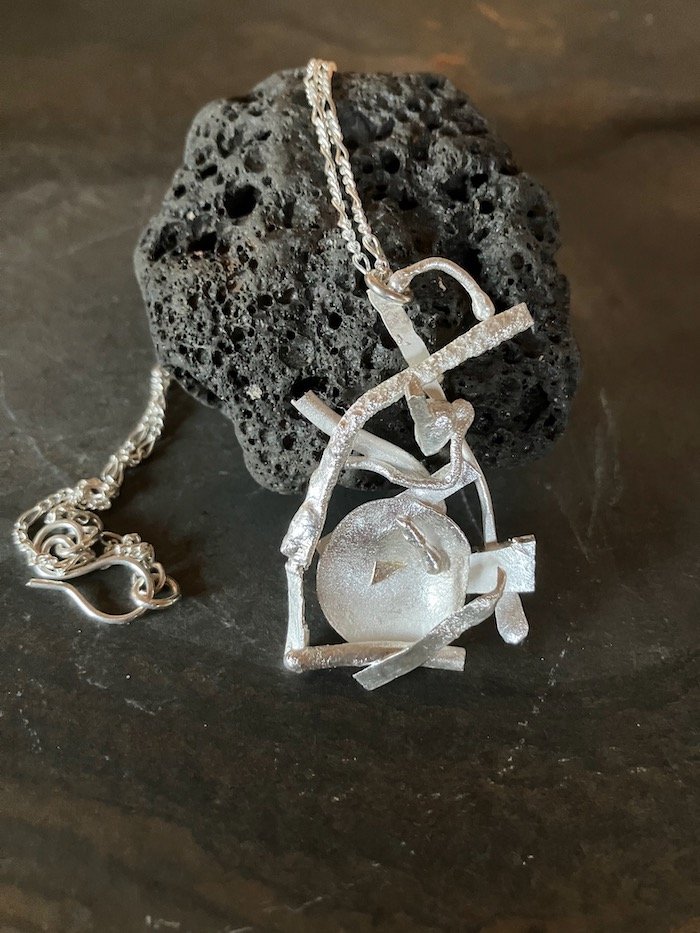 Handmade abstract pendant in sterling silver