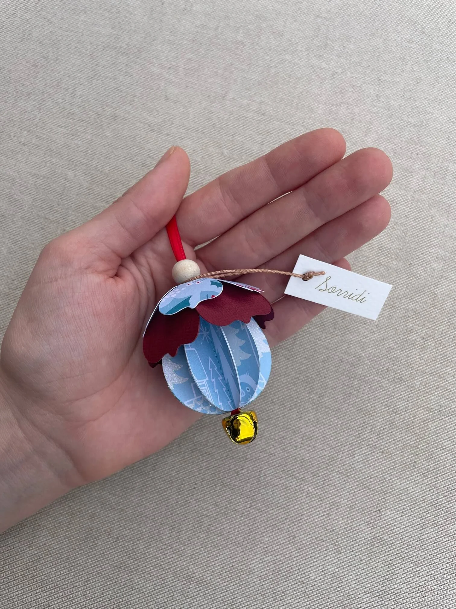 campanella "SORRIDI" natale azzurra glitter