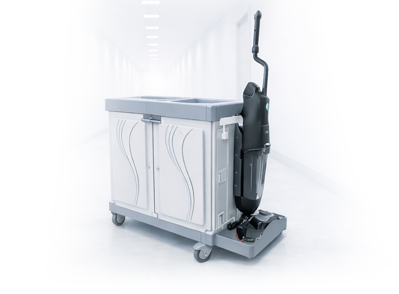 DRYFT floor cleaner mounted to a janitorial cart with a universal cleaning trolley bracket replacing the traditional mop bucket workflow.