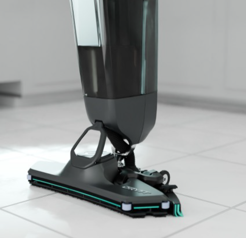 DRYFT scrubber dryer parked upright on its head stand, showing stable, space-saving storage so the machine can be left safely between cleans.