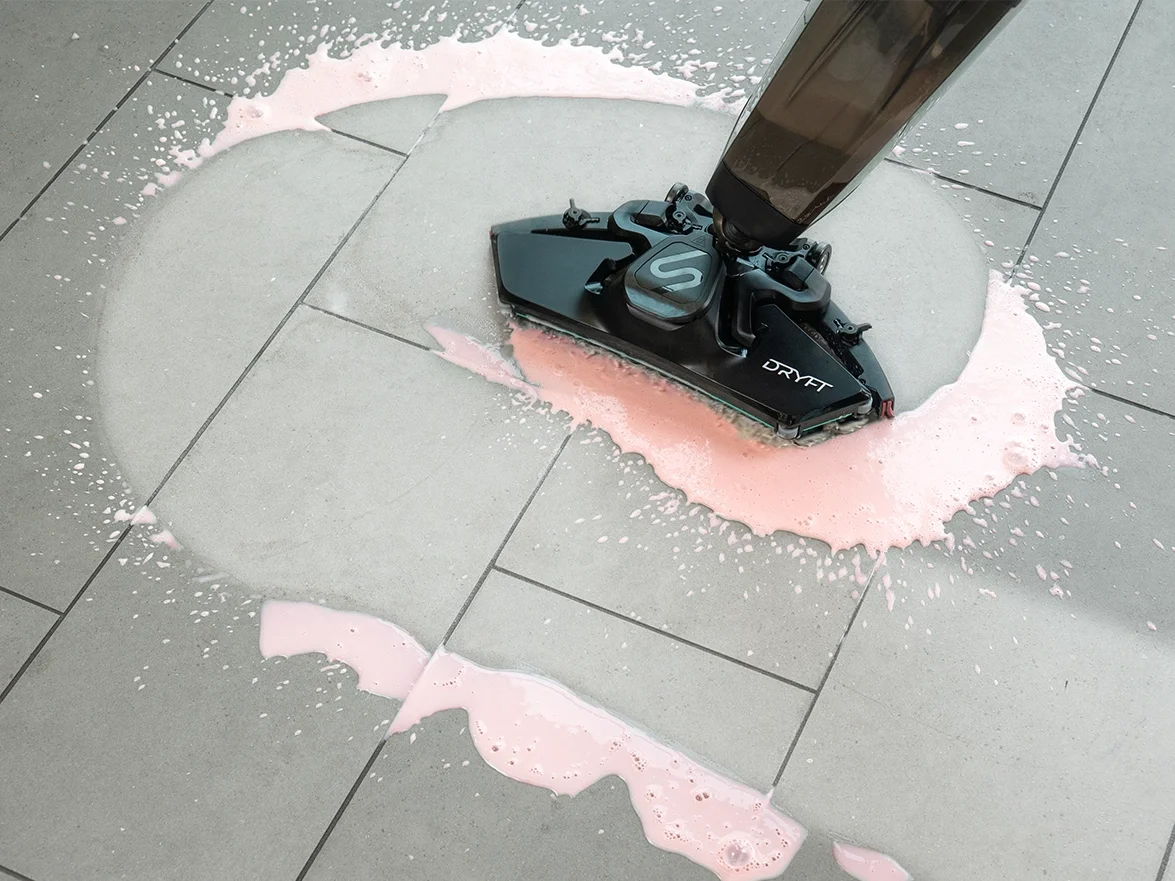 DRYFT sucking up a spillage as it cleans the floor