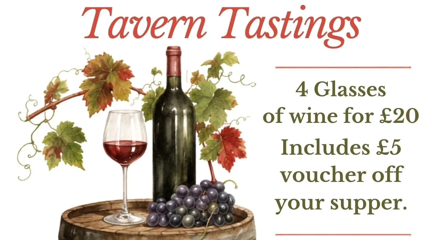 A promotional sign for tavern tastings featuring a bottle of red wine, a glass of red wine, and grapes on a wooden surface with autumn leaves.