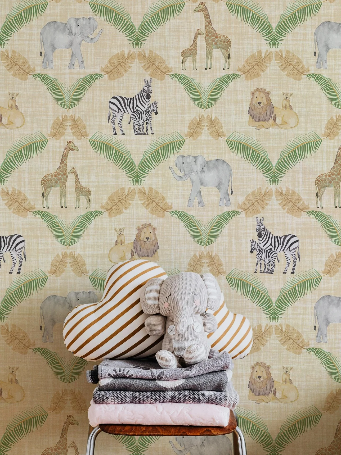 We&rsquo;re going wild! 😜 I created this newest design featuring watercolor giraffes, elephants, zebras, and lions for the @spoonflower Jungle Nursery design challenge. The soothing tans and greens are perfect for a nursery yet elevated enough to gr