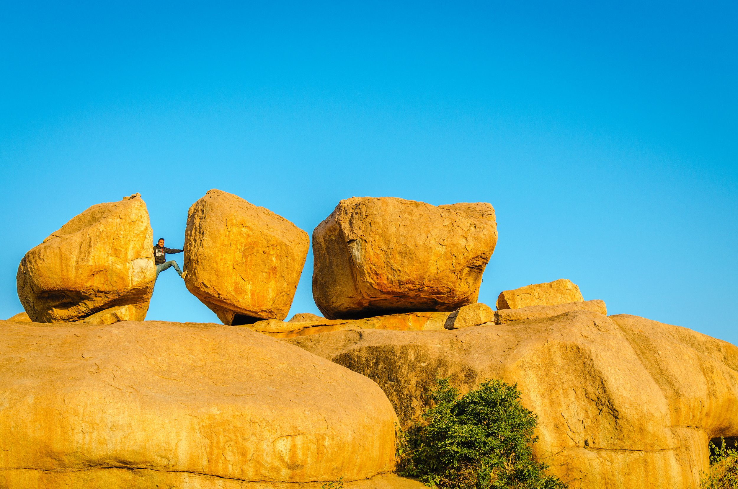 Climbing the rocks - Hampi, India