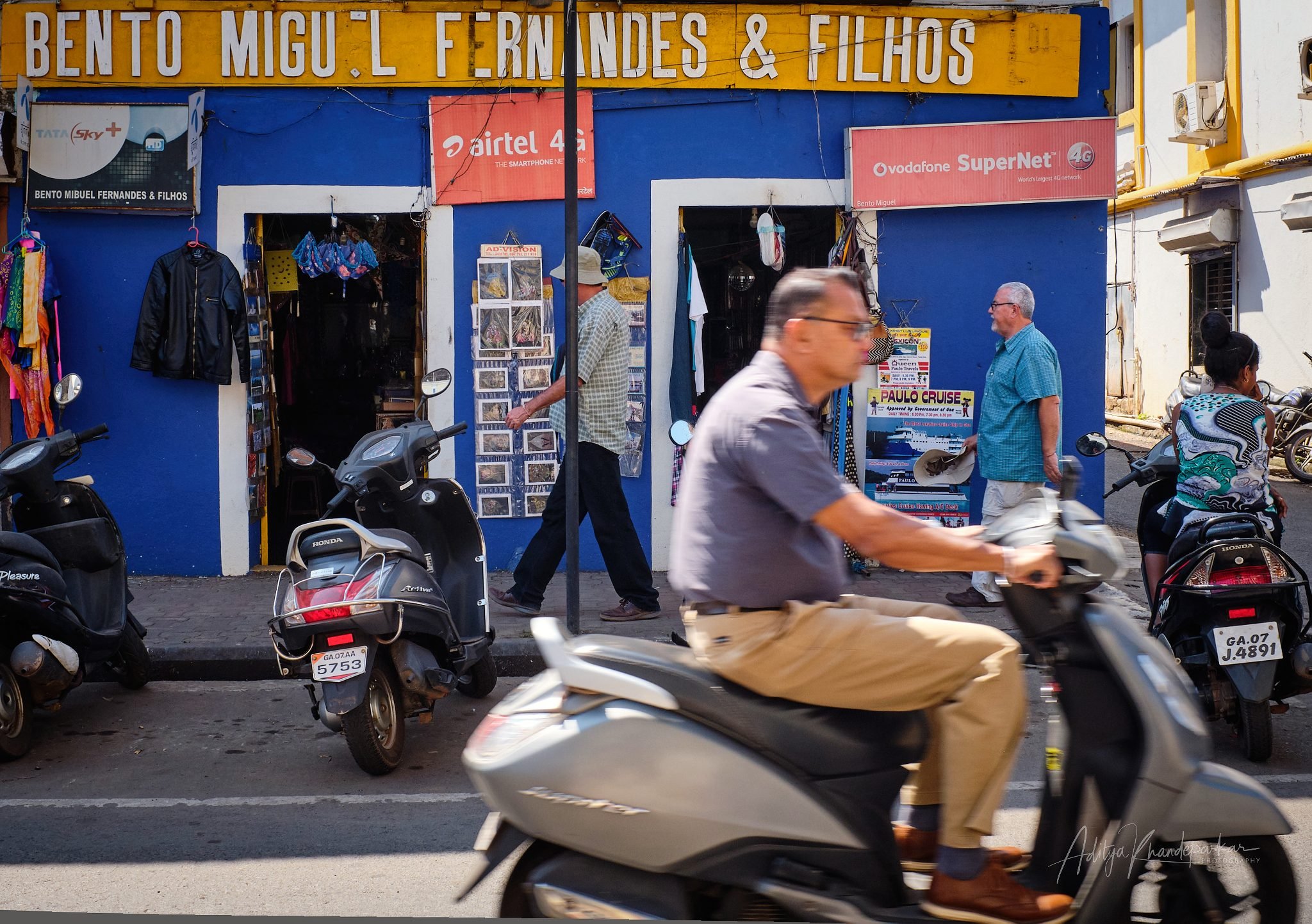 09-Scooter and two men.jpg