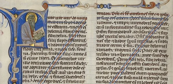 Medieval manuscript with crossed-out text.