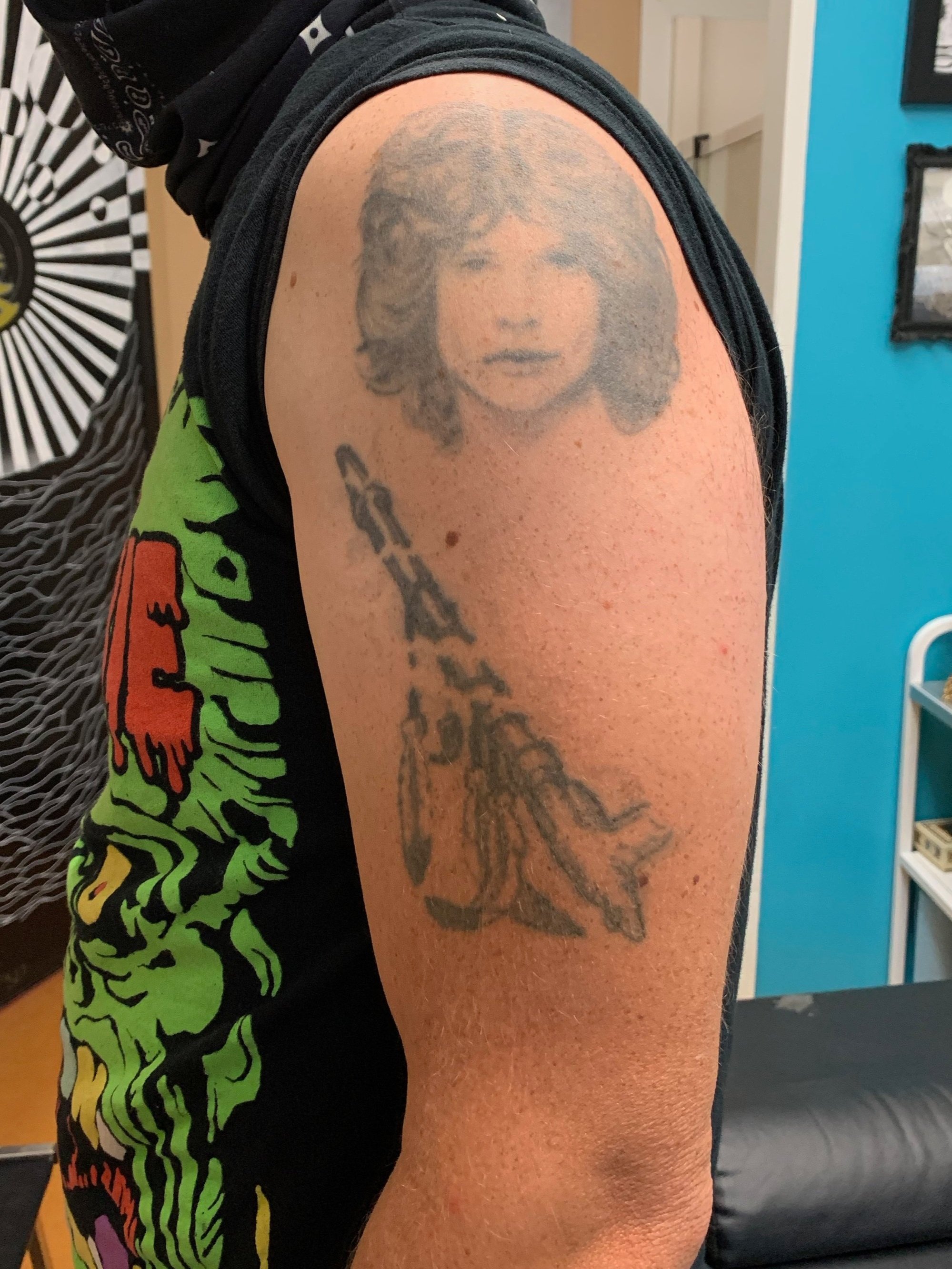 Before: aged black-and-grey portrait of Jinm Morrison and an indigenous pipe.