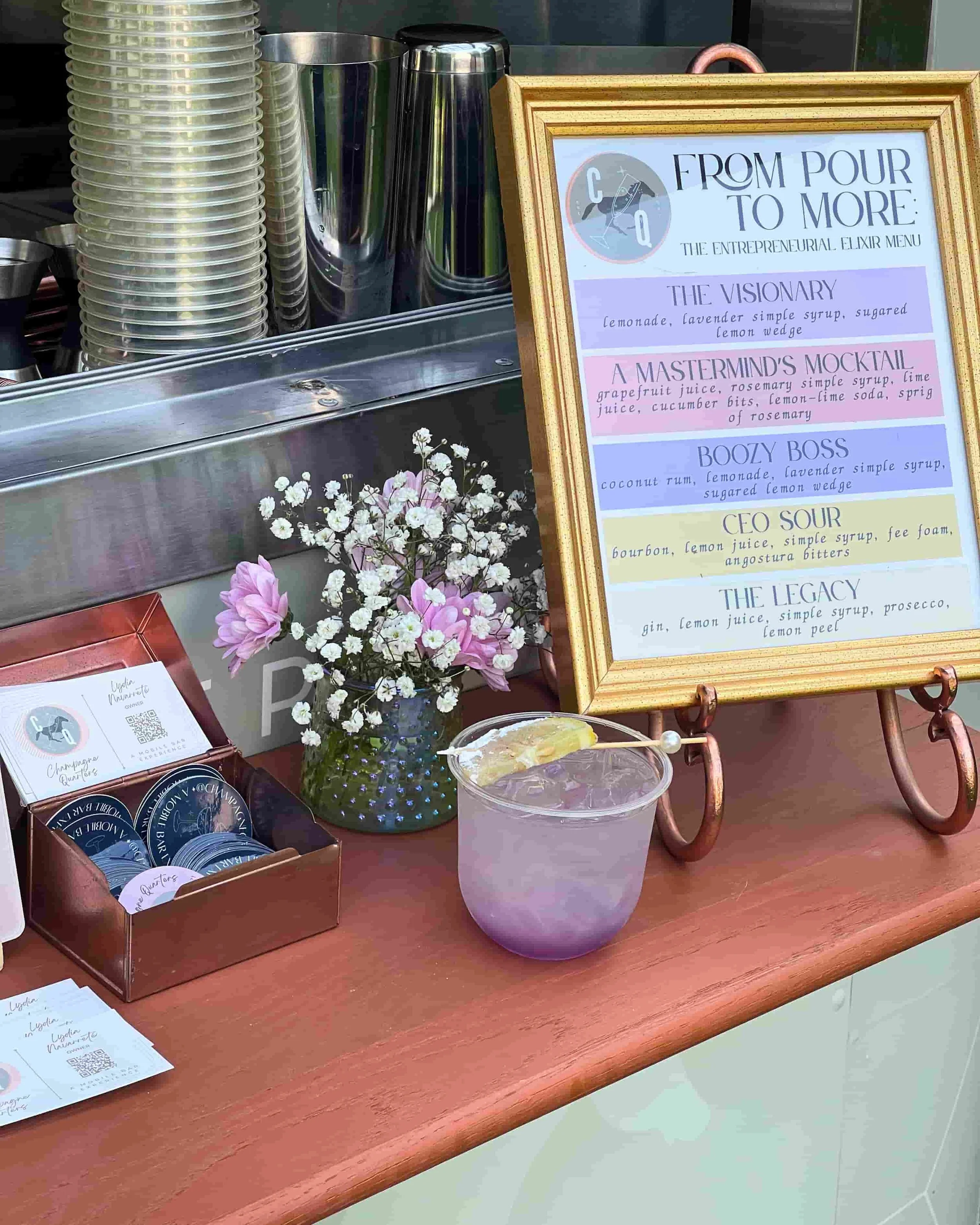 Champagne Quarters horse trailer mobile bar serving signature cocktails for networking event in Maryland.