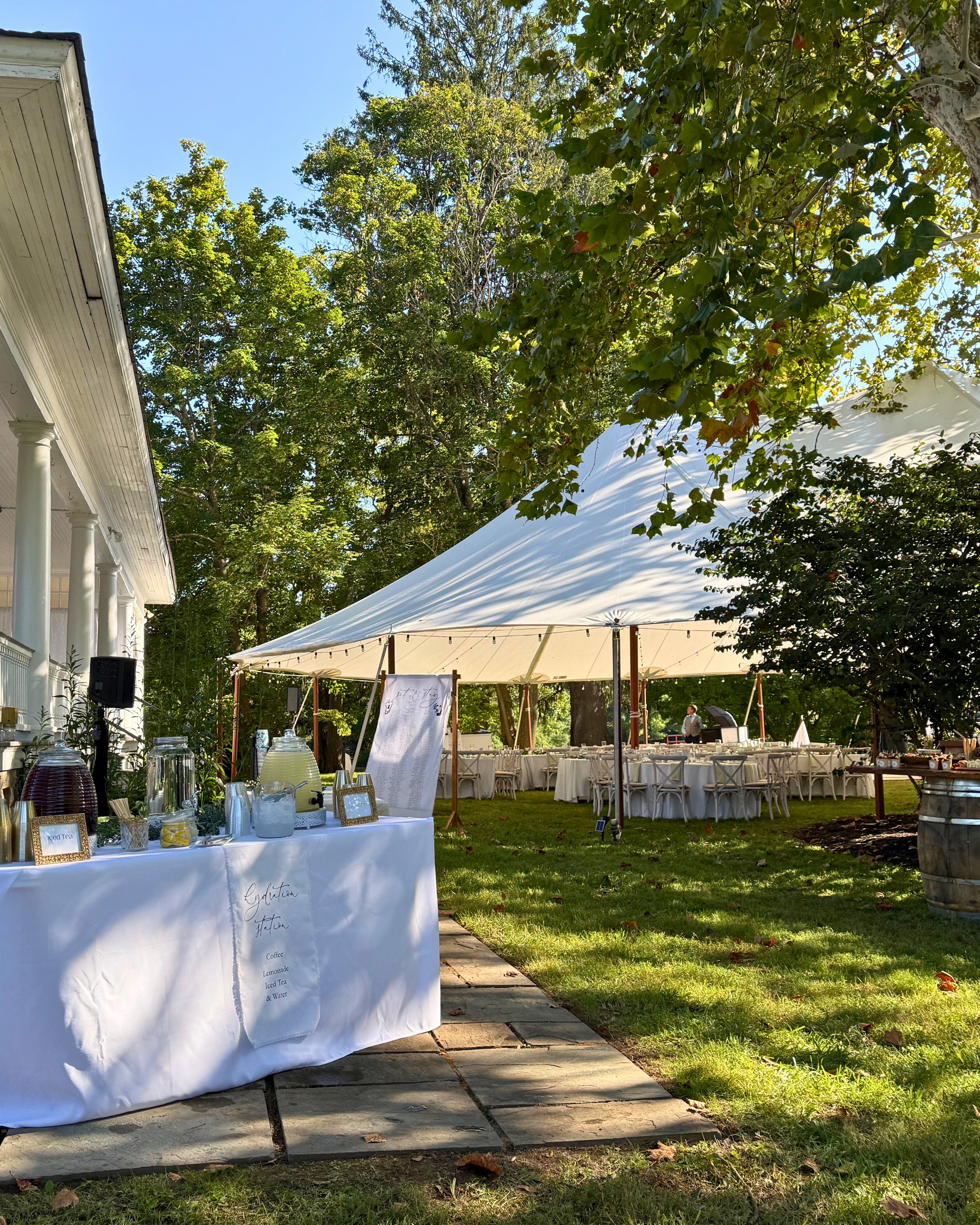Hydration station setup at a wedding on a horse farm. Maryland mobile bar services.