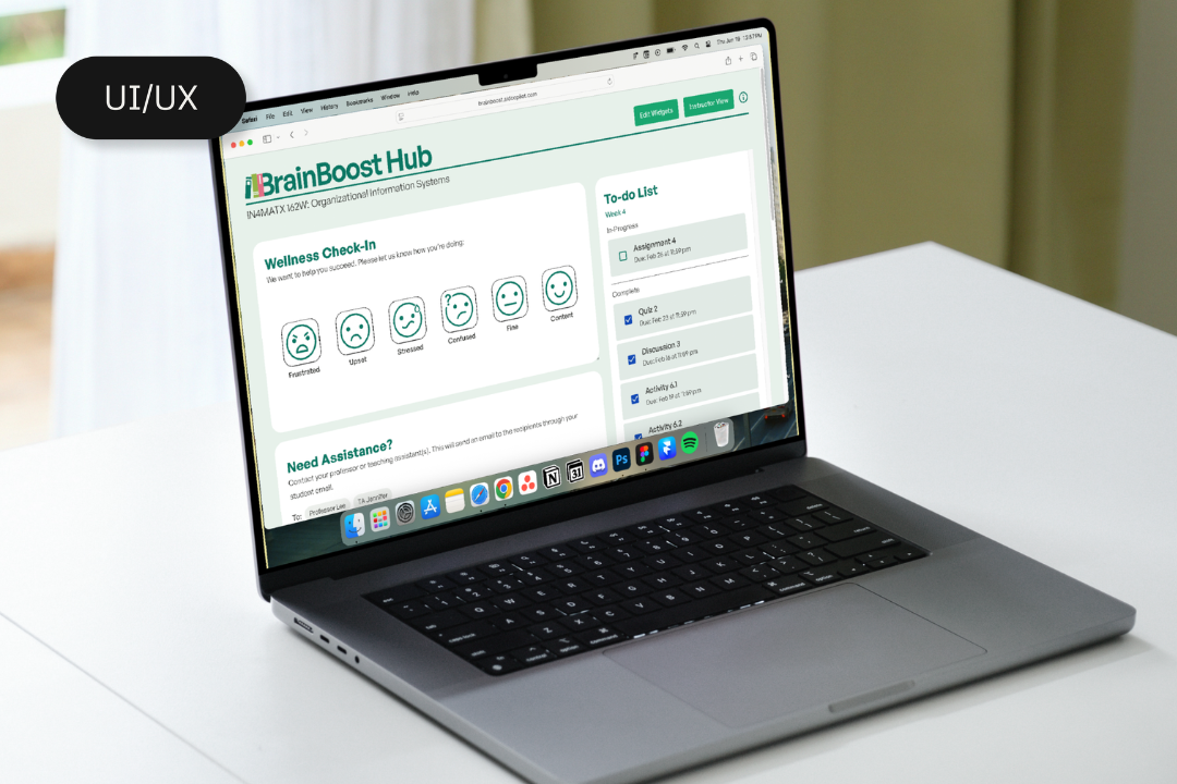 Open laptop displaying a web-based UI/UX design for BrainBoost Hub, featuring a wellness check-in section with emoticon expressions, a to-do list, and a chat window, on a white desk with a green curtain in the background.