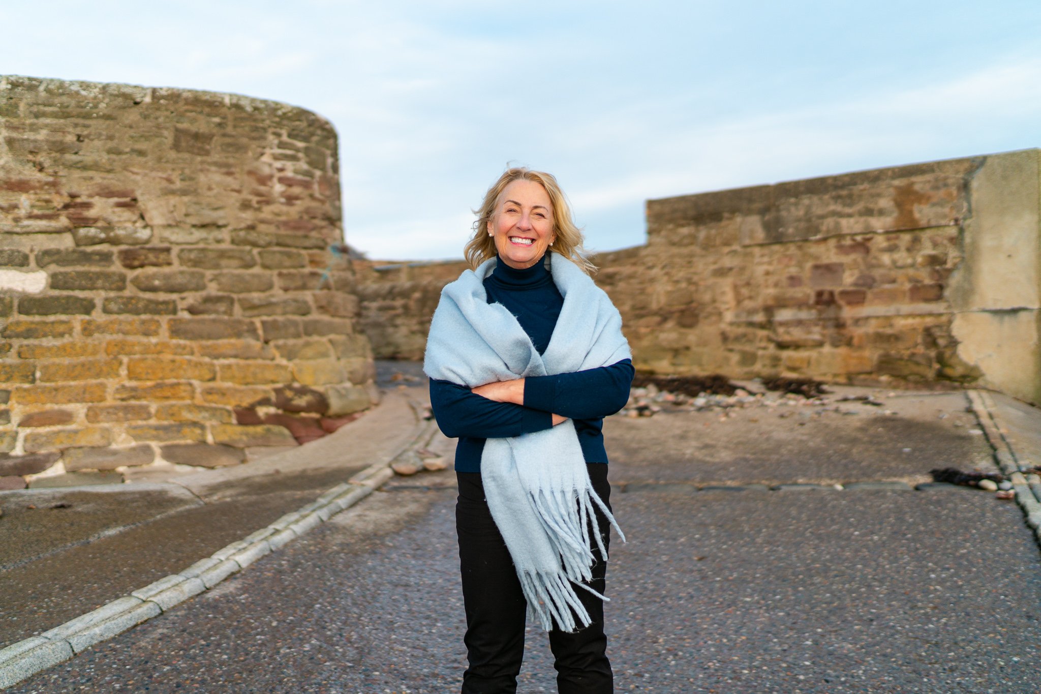 Life coach photographed standing outside on Scottish coast