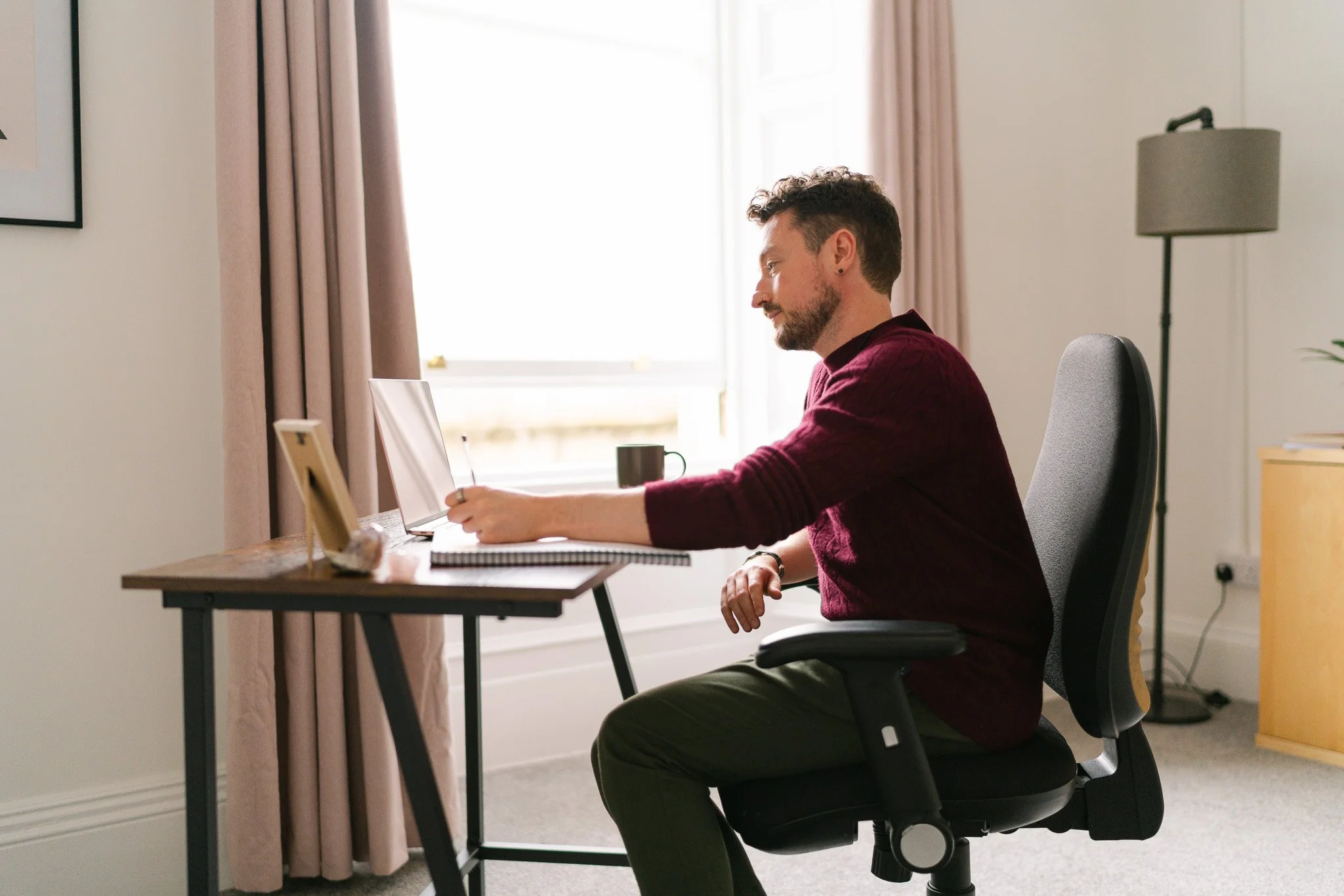 Dr Calum Rankin, Clinical Psychologist photographed at his desk in his Dundee office