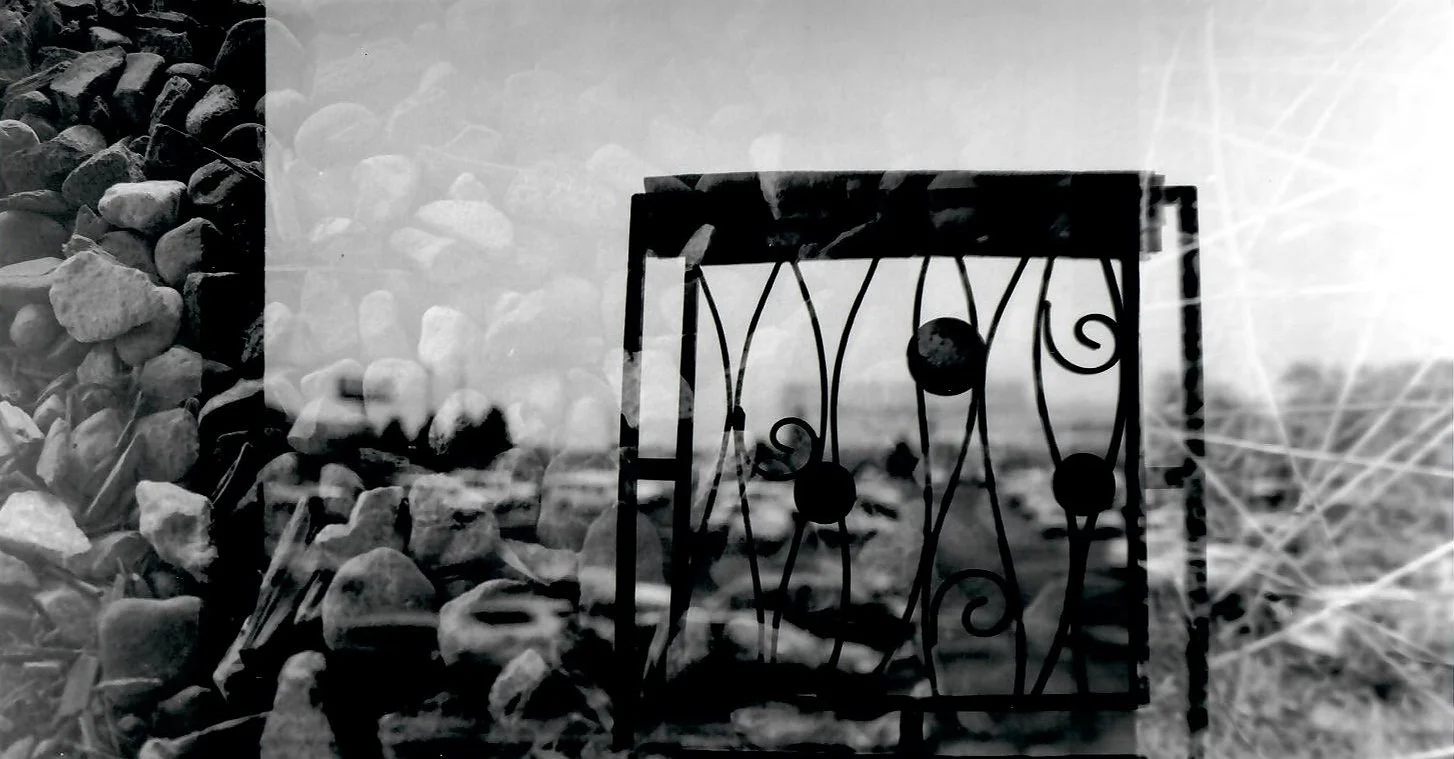 This is a continuous double exposure. I went though the roll of film, then once it was done I took the tail back out, cut a new one and put it back through the camera so the photo wouldn't align with the first photos taken.